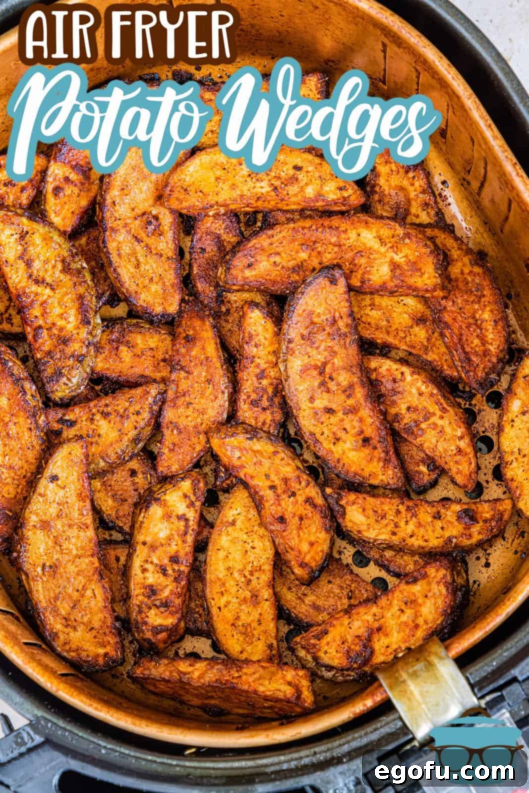 Pinterest image of Air Fryer Potato Wedges in air fryer basket overhead.