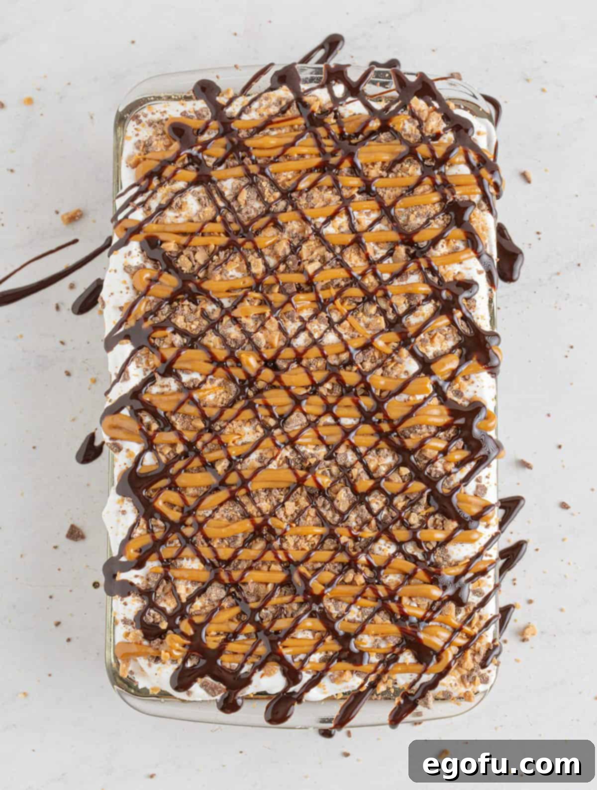 Pure Ecstasy Dessert 11 Chocolate syrup drizzled over cake.