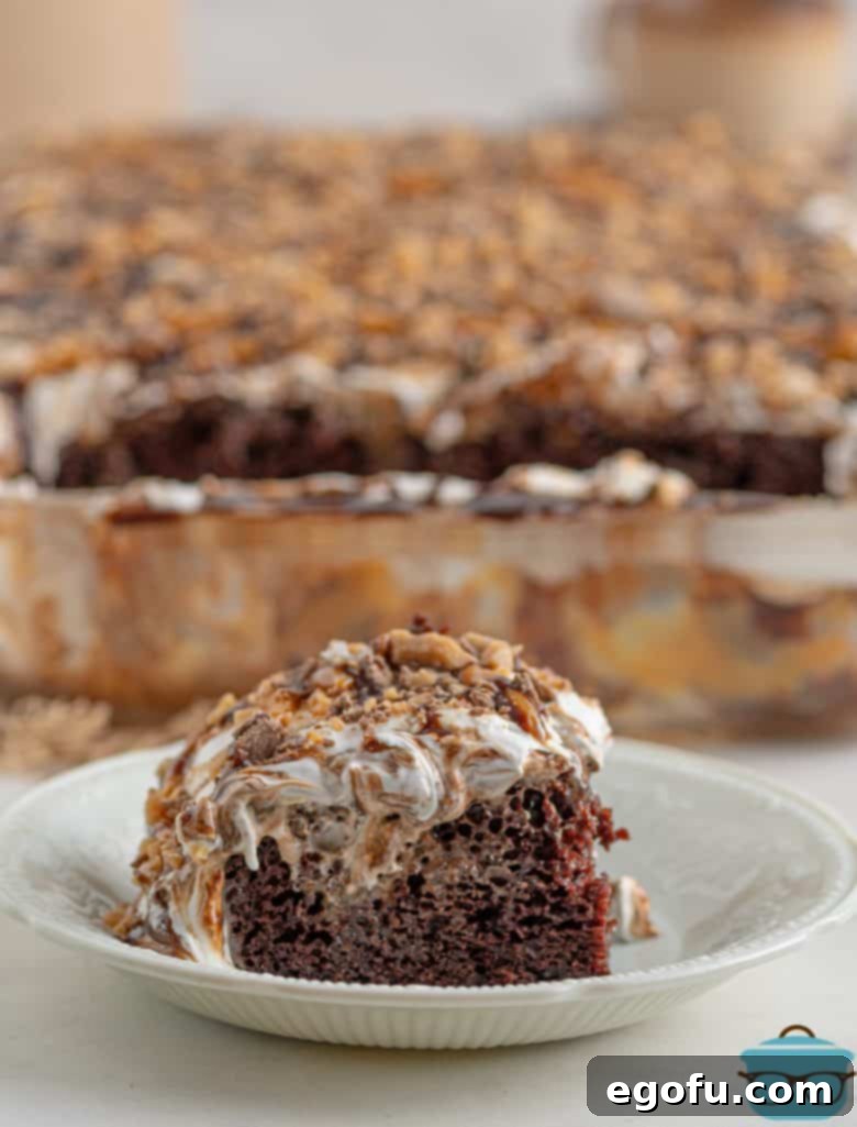 Pure Ecstasy Dessert 13 Slice of Better Than Sex Cake o white plate.