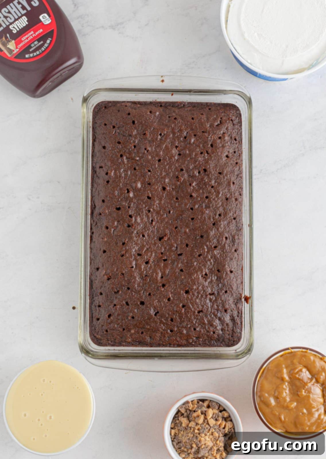 Pure Ecstasy Dessert 5 Holes poked in cake.