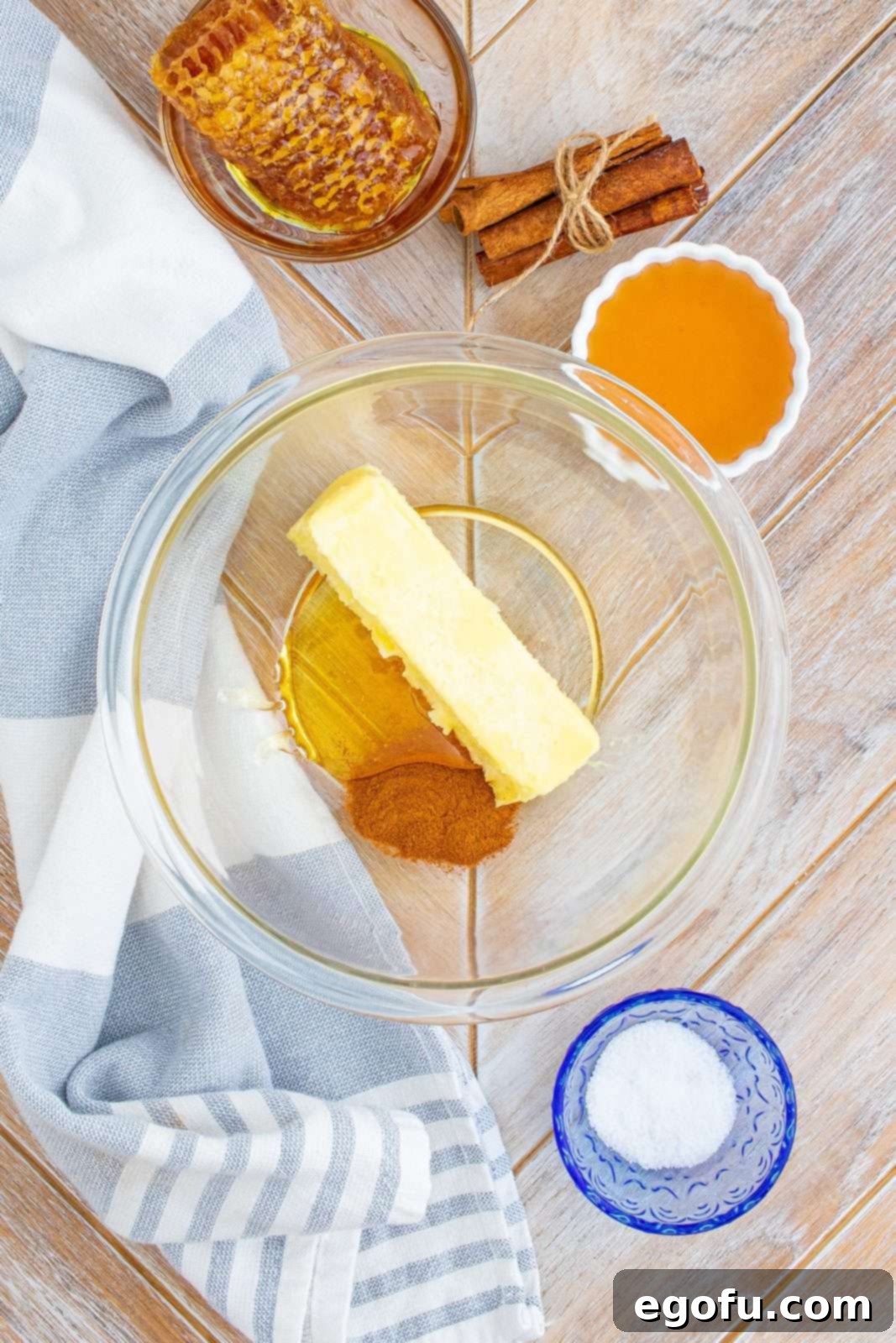 Texas Roadhouse Signature Cinnamon Honey Butter 4 Butter, cinnamon, honey and salt in clear bowl.