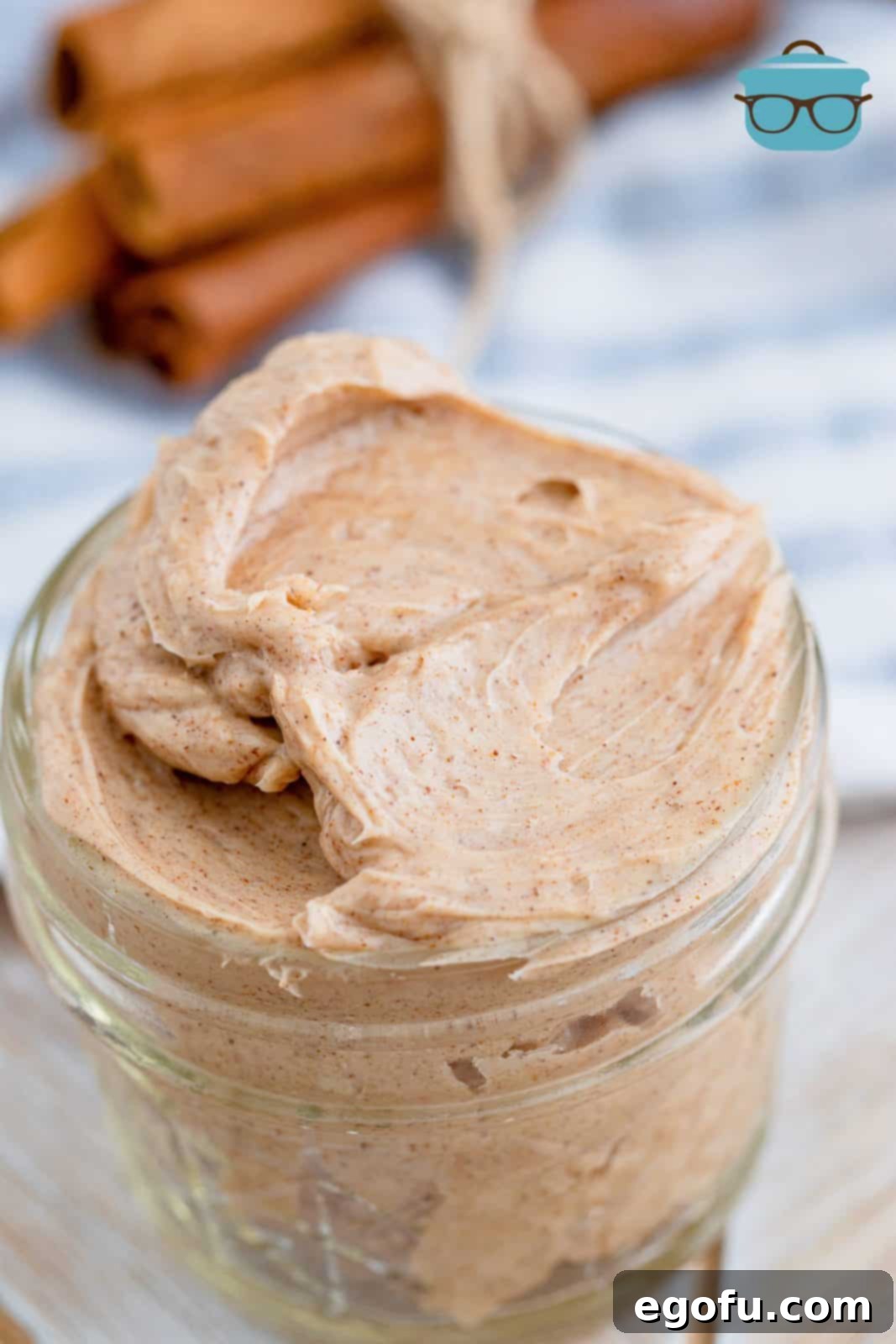 Texas Roadhouse Signature Cinnamon Honey Butter 6 Close up of Texas Roadhouse Cinnamon Honey Butter close up in jar.