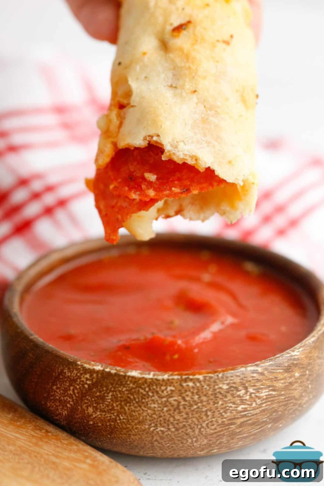 Stuffed Pizza Breadsticks 11 Pepperoni Roll Breadstick dipped in marinara sauce.
