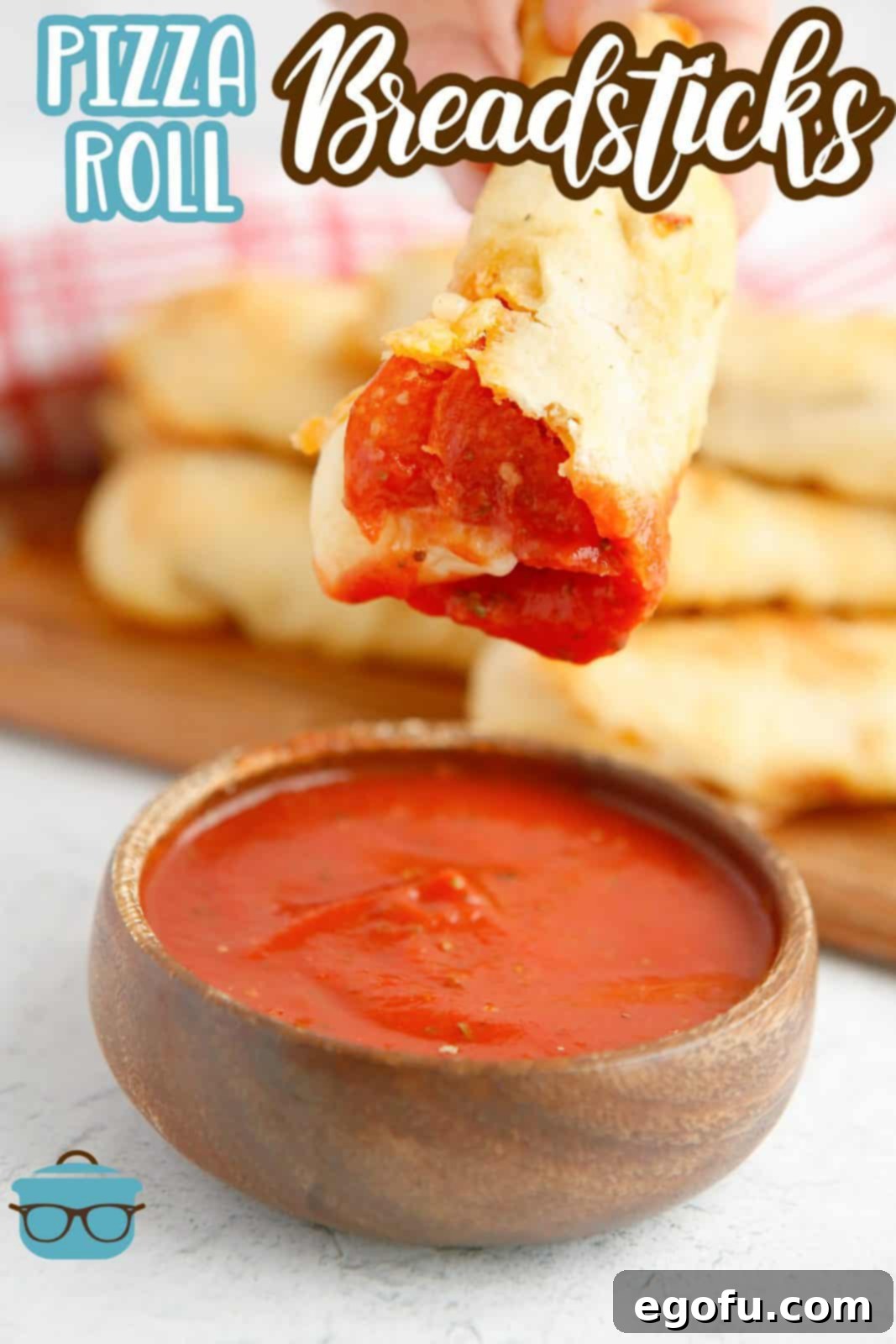 Stuffed Pizza Breadsticks 3 Pinterest image of one Pepperoni Roll Breadstick dipped in marinara sauce.