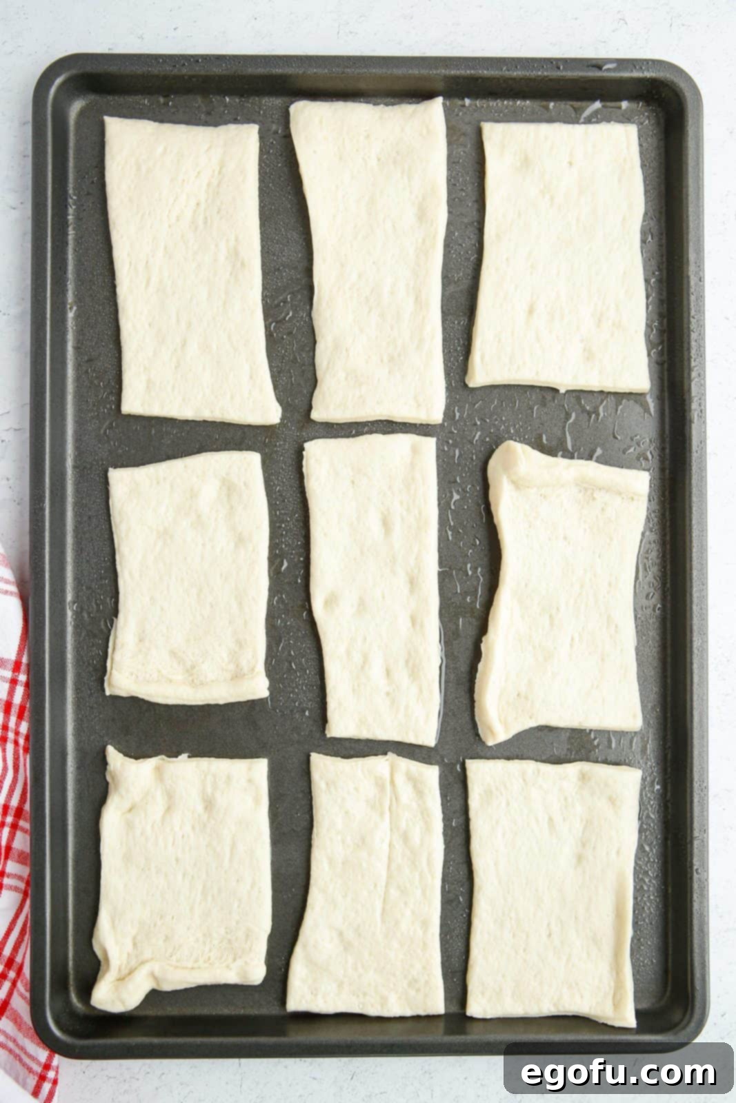 Stuffed Pizza Breadsticks 5 Cut up rectangles of pizza dough on prepared baking sheet.