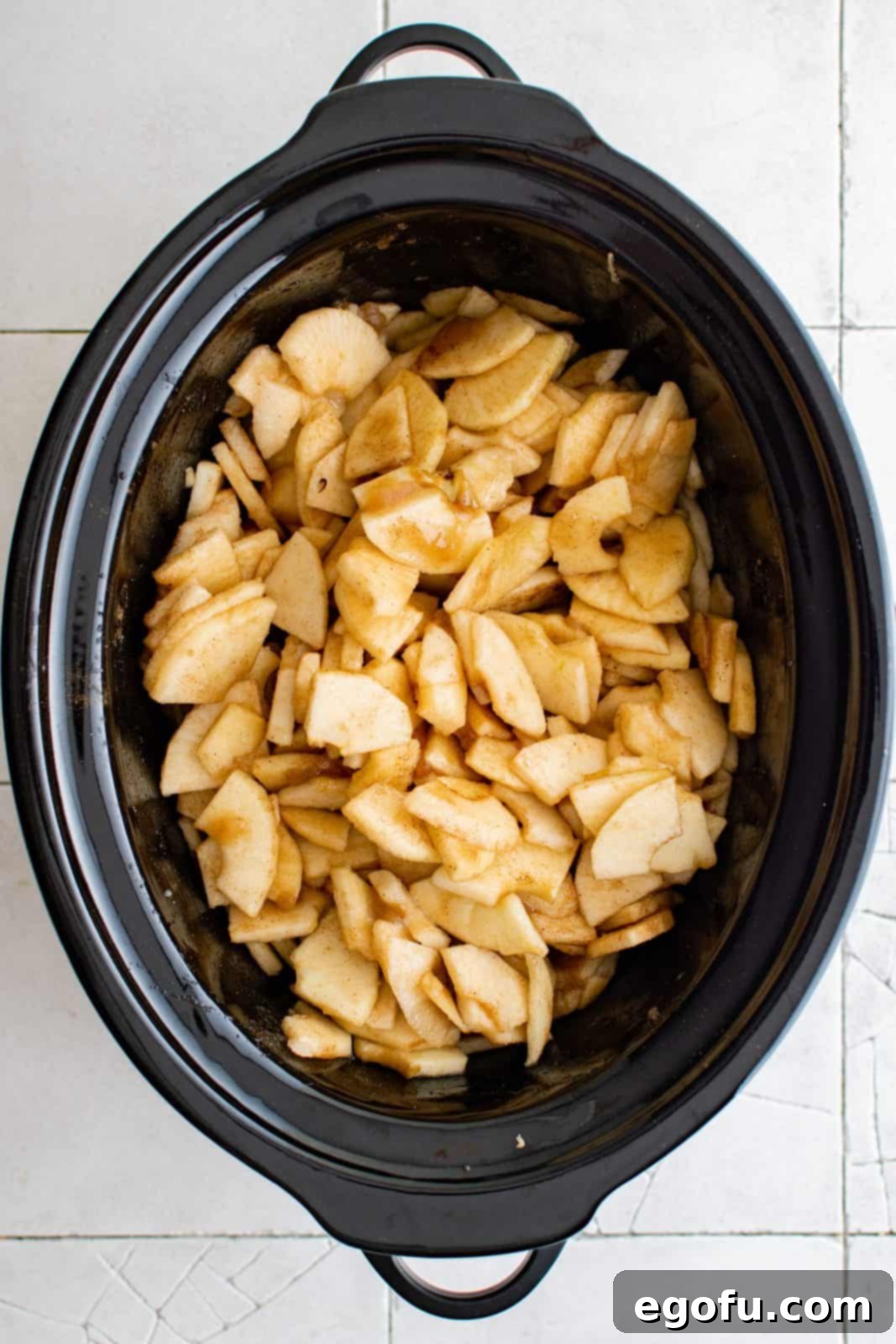 All ingredients stirred up in slow cooker.