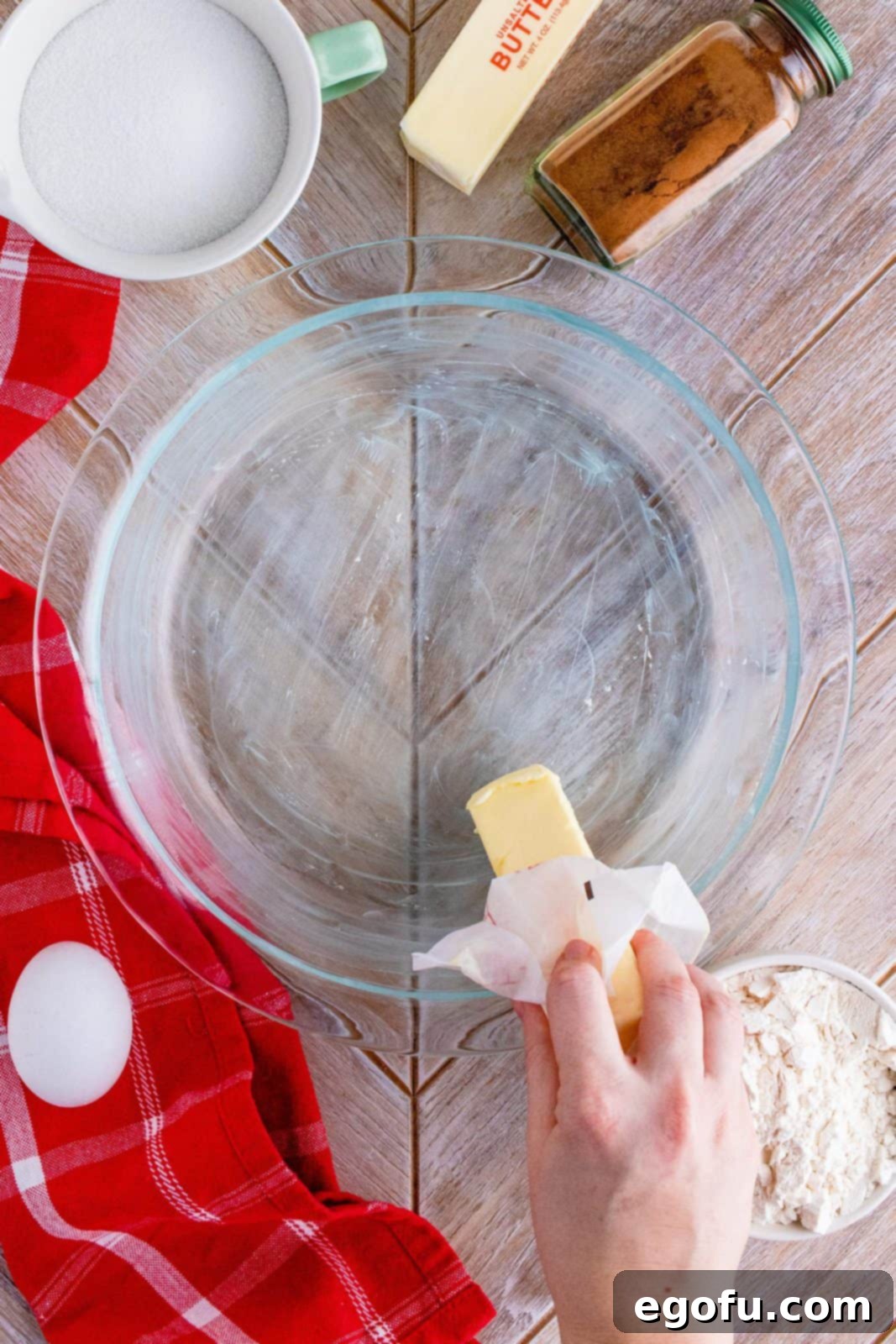 Grammies Homestyle Swedish Apple Pie 7 Hand buttering pie plate.