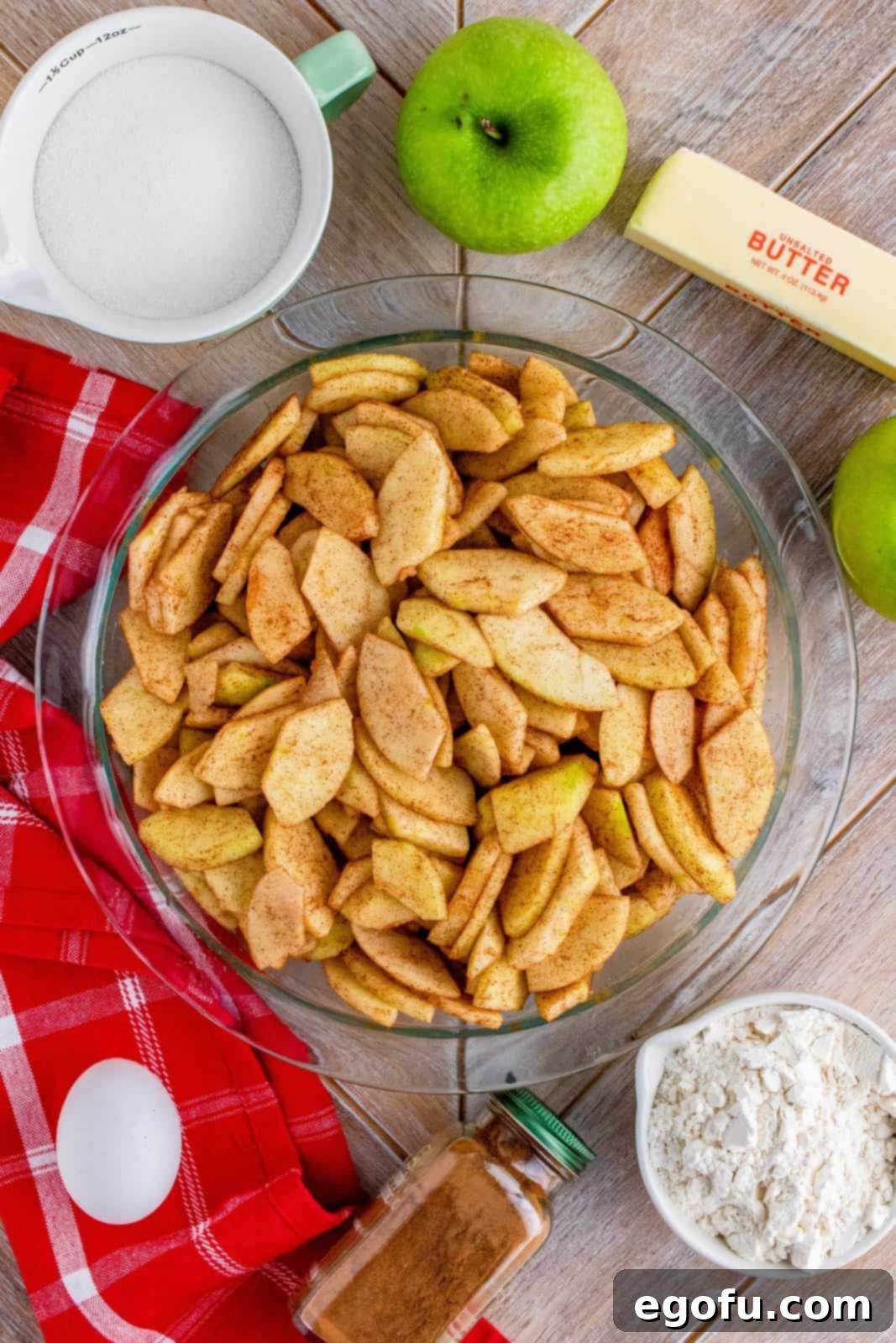 Grammies Homestyle Swedish Apple Pie 8 Apples added to pie plate.