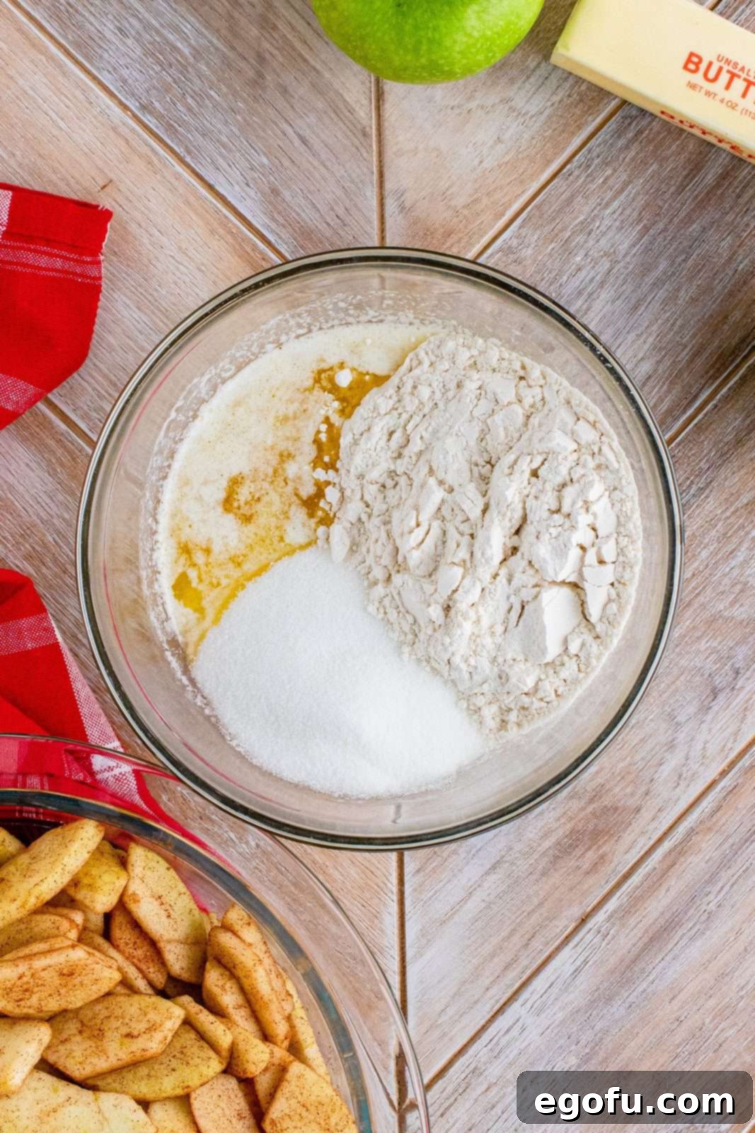 Grammies Homestyle Swedish Apple Pie 9 Melted butter, sugar and flour in bowl.