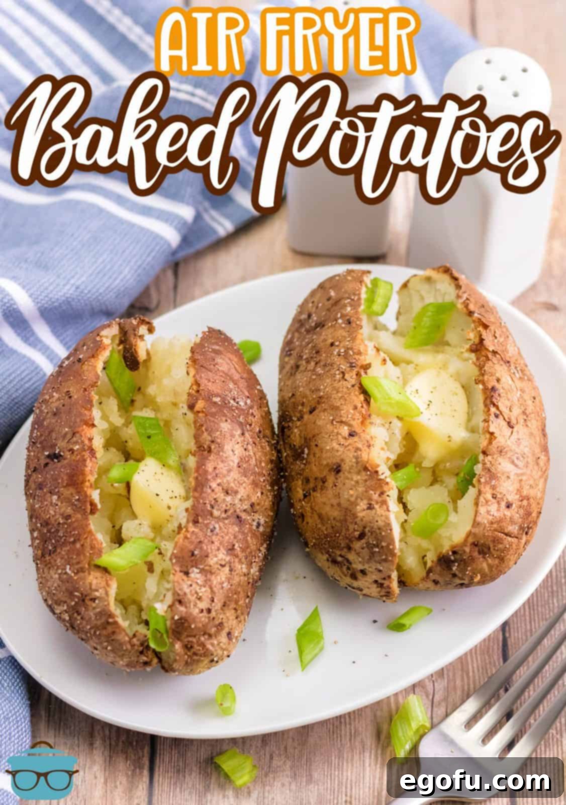 Pinterest image of two Air Fryer Baked Potatoes on white plate with blue striped linen.