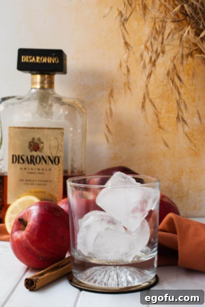 A glass filled with ice, ready for the cocktail.