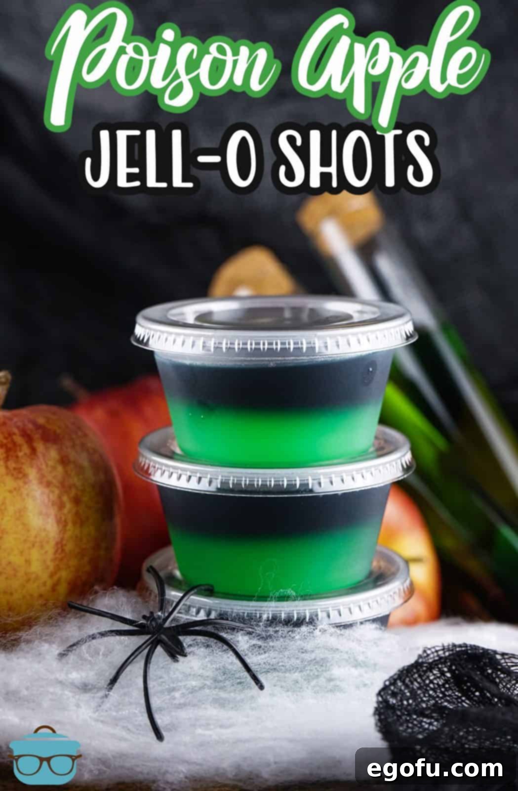 Pinterest image of two stacked Halloween Poison Apple Jell-O Shots with fake spider and web.