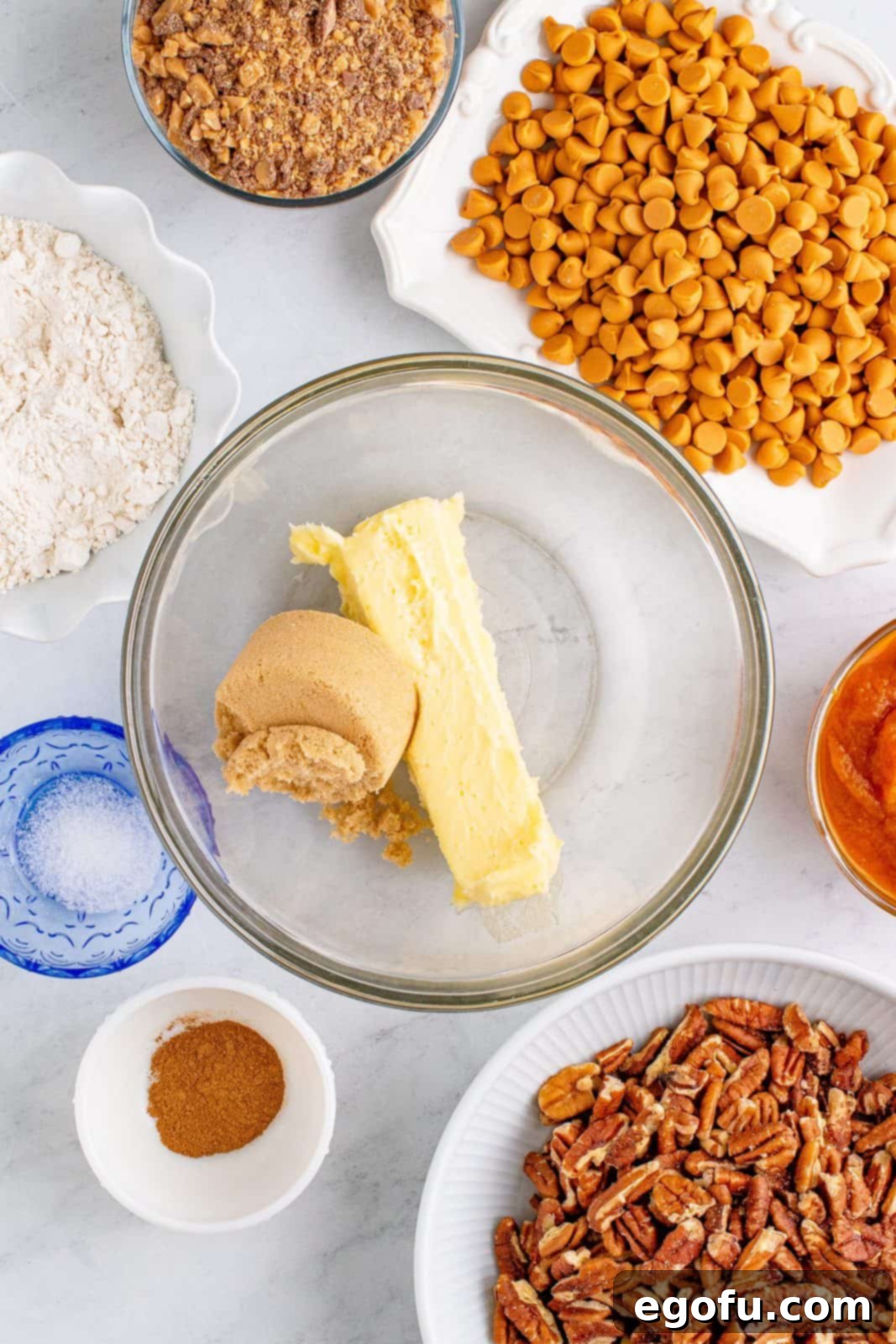 Autumn Magic Pumpkin Bars 5 Creamed butter and brown sugar in a bowl, showing the light and fluffy texture.