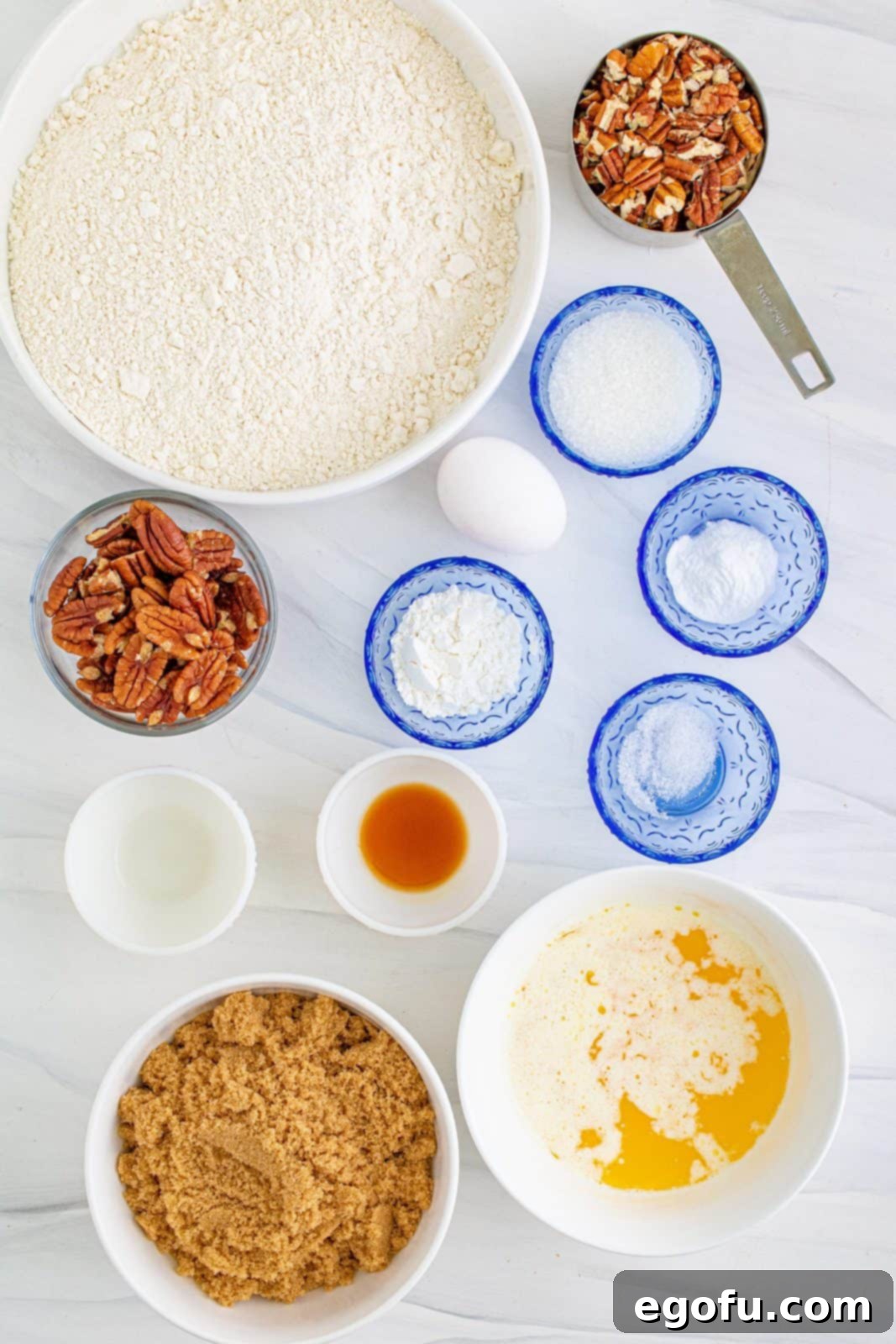 Ingredients needed: all-purpose flour, cornstarch, baking soda, fine sea salt, unsalted butter, light brown sugar, egg, vanilla extract, butter extract, pecans and decorators sugar.