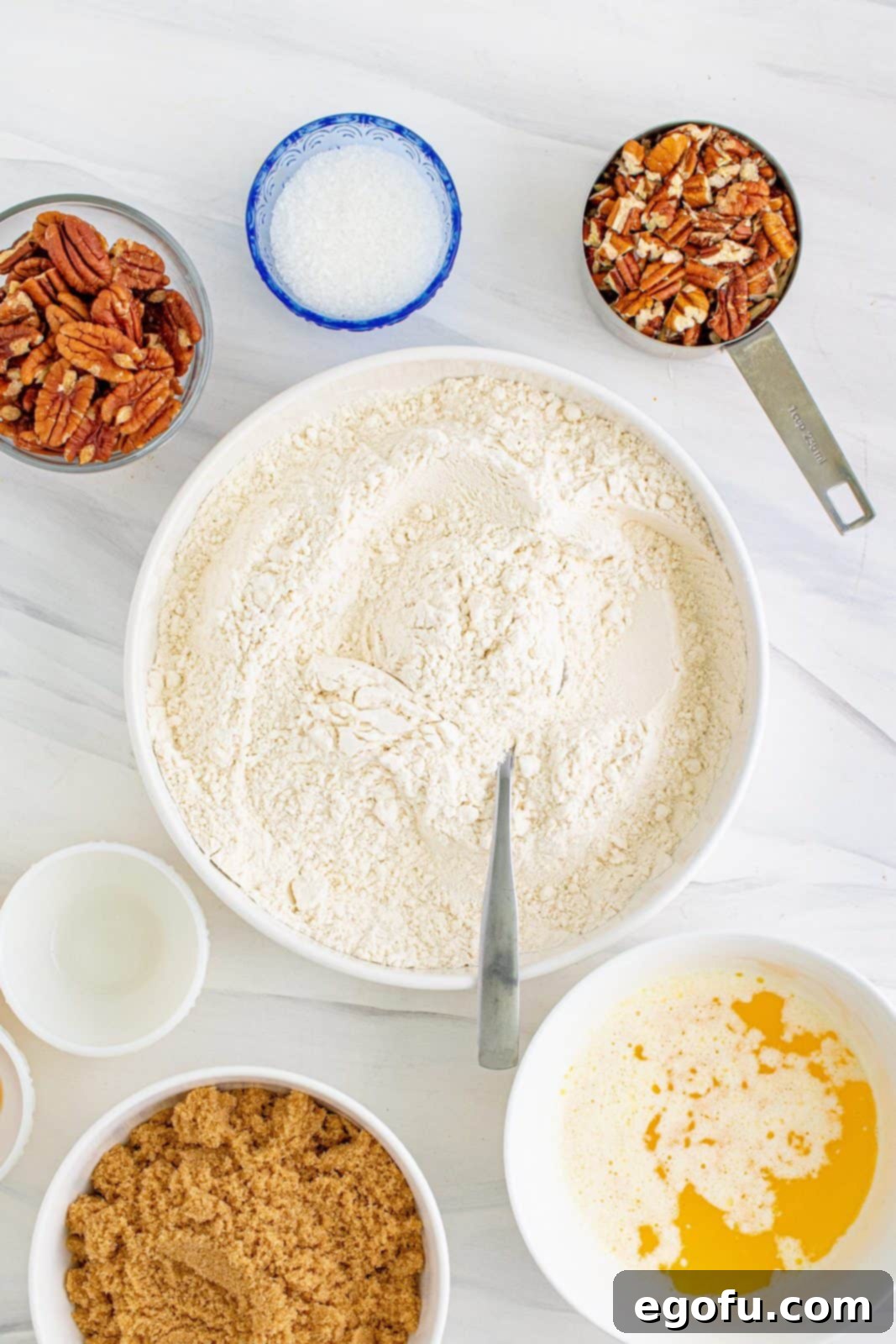 Dry ingredients mixed together in white bowl.