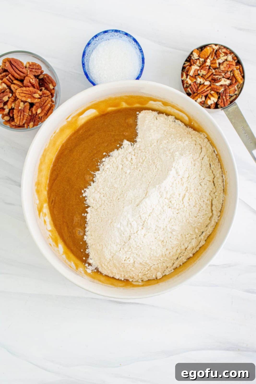 Dry ingredients added to wet ingredients.