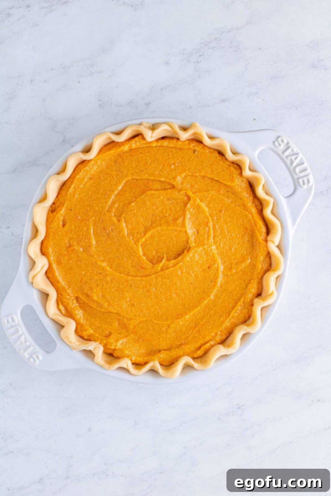 Velvet Sweet Potato Dream Pie 11 Sweet potato filling added to pie crust in crust.