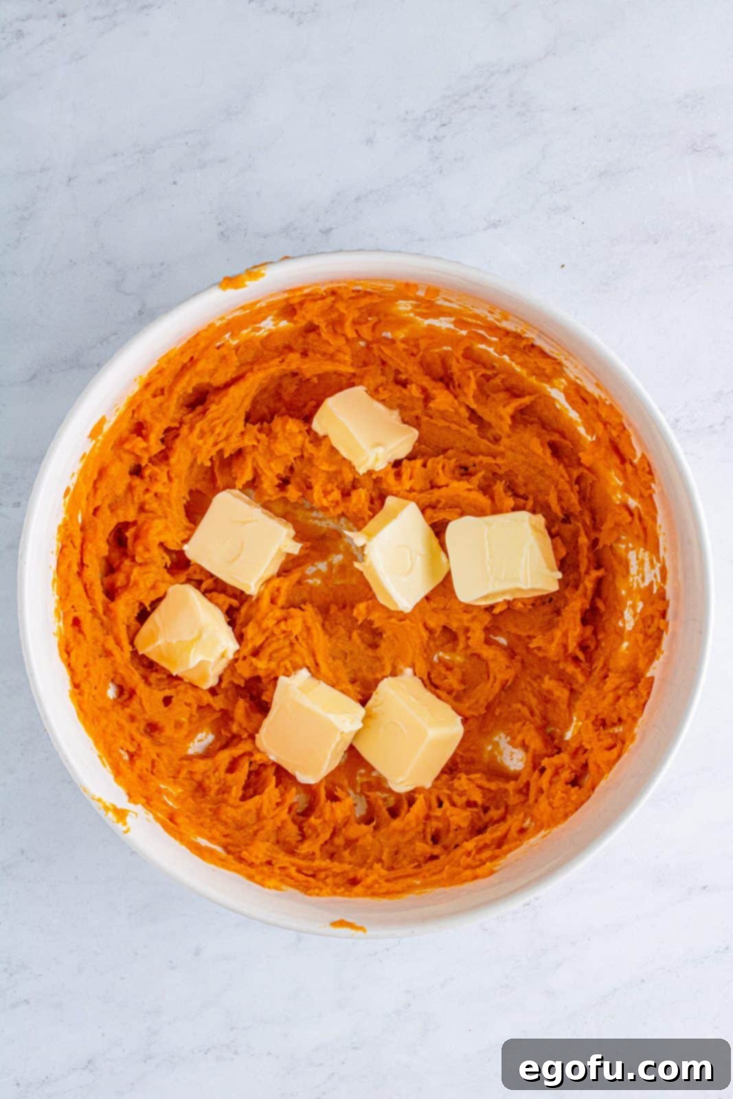 Velvet Sweet Potato Dream Pie 6 Butter added to blended sweet potatoes.