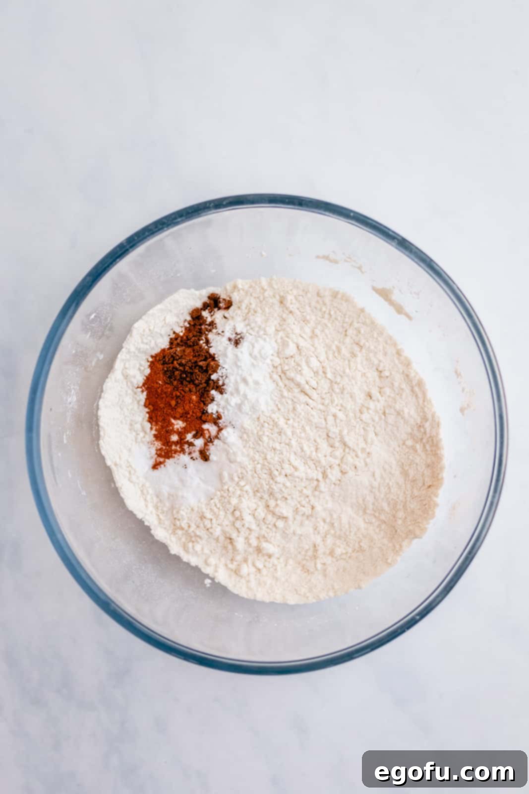 Dry ingredients added to bowl.