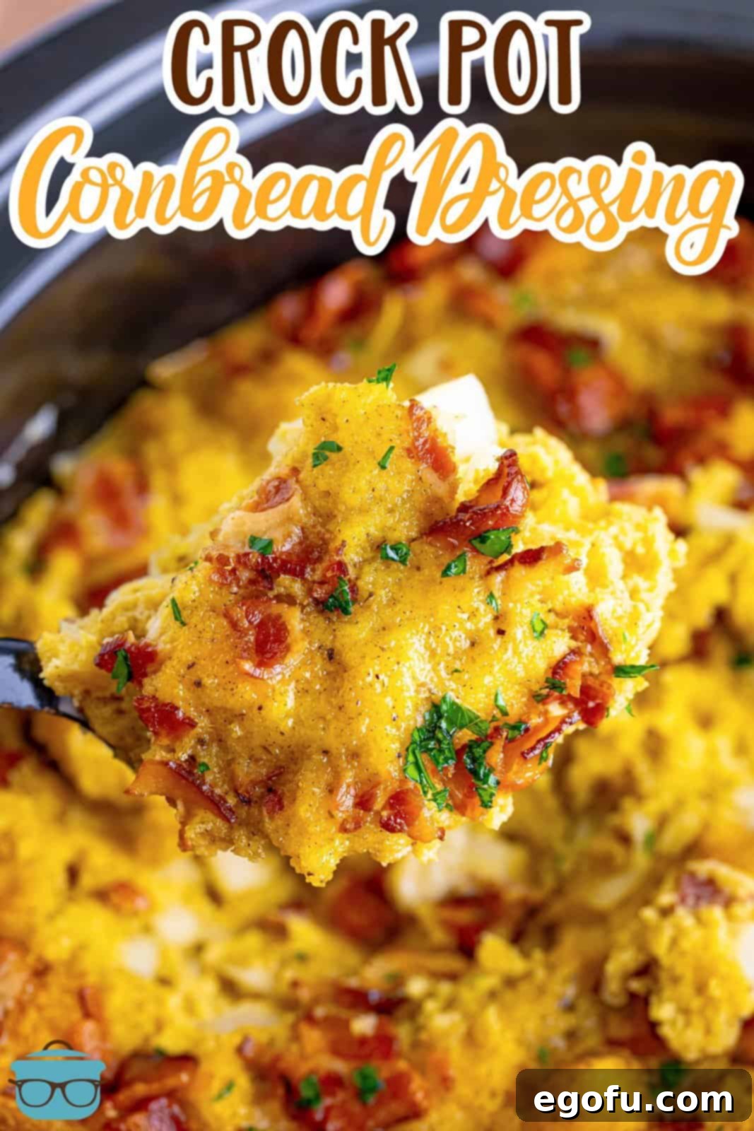 Homestyle Slow Cooker Cornbread Dressing 3 a spoon scooping up some cornbread dressing over a crock pot.