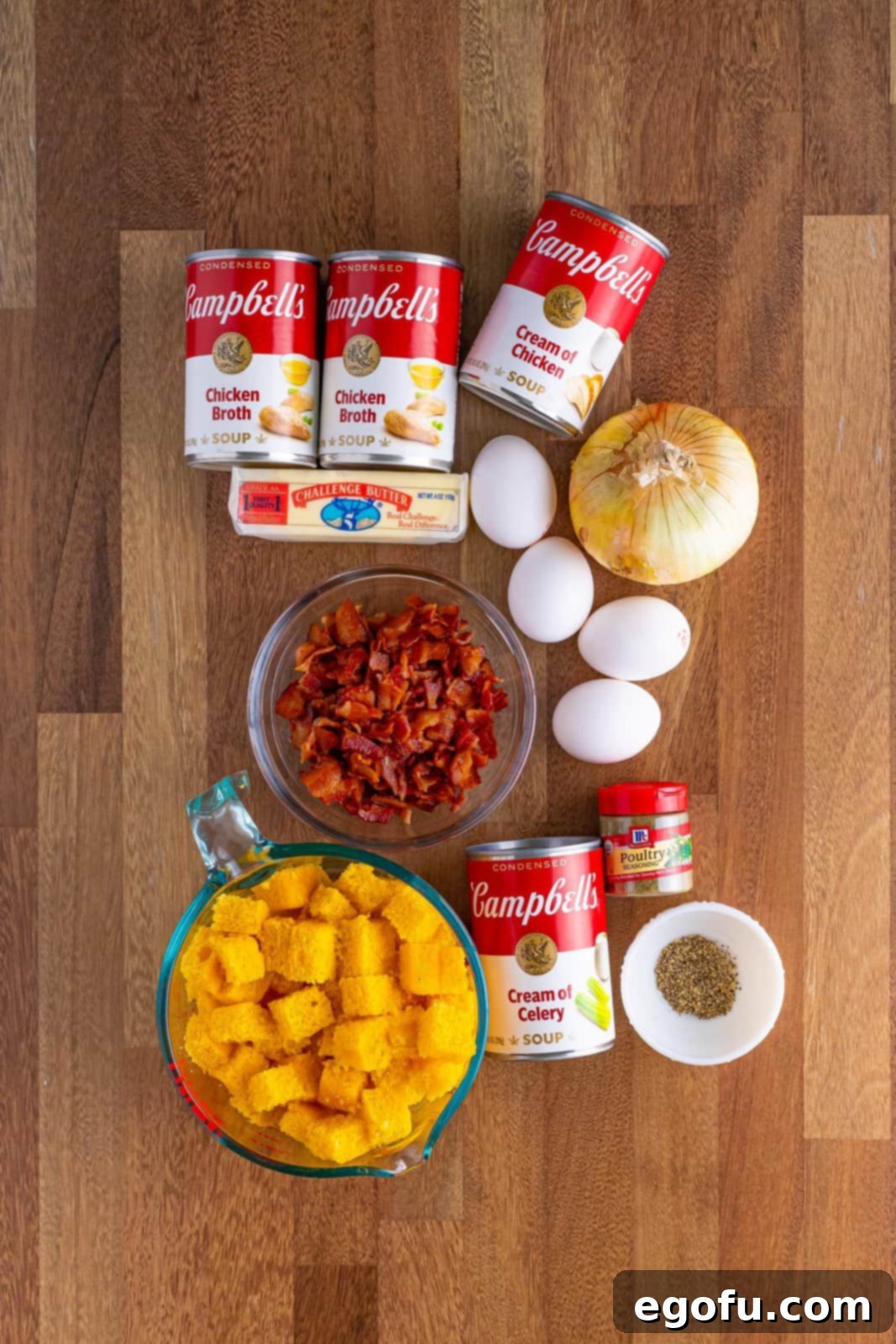 Homestyle Slow Cooker Cornbread Dressing 4 cornbread, eggs, onion, poultry seasoning, pepper, cream of chicken soup, cream of celery soup, chicken broth, bacon and butter.