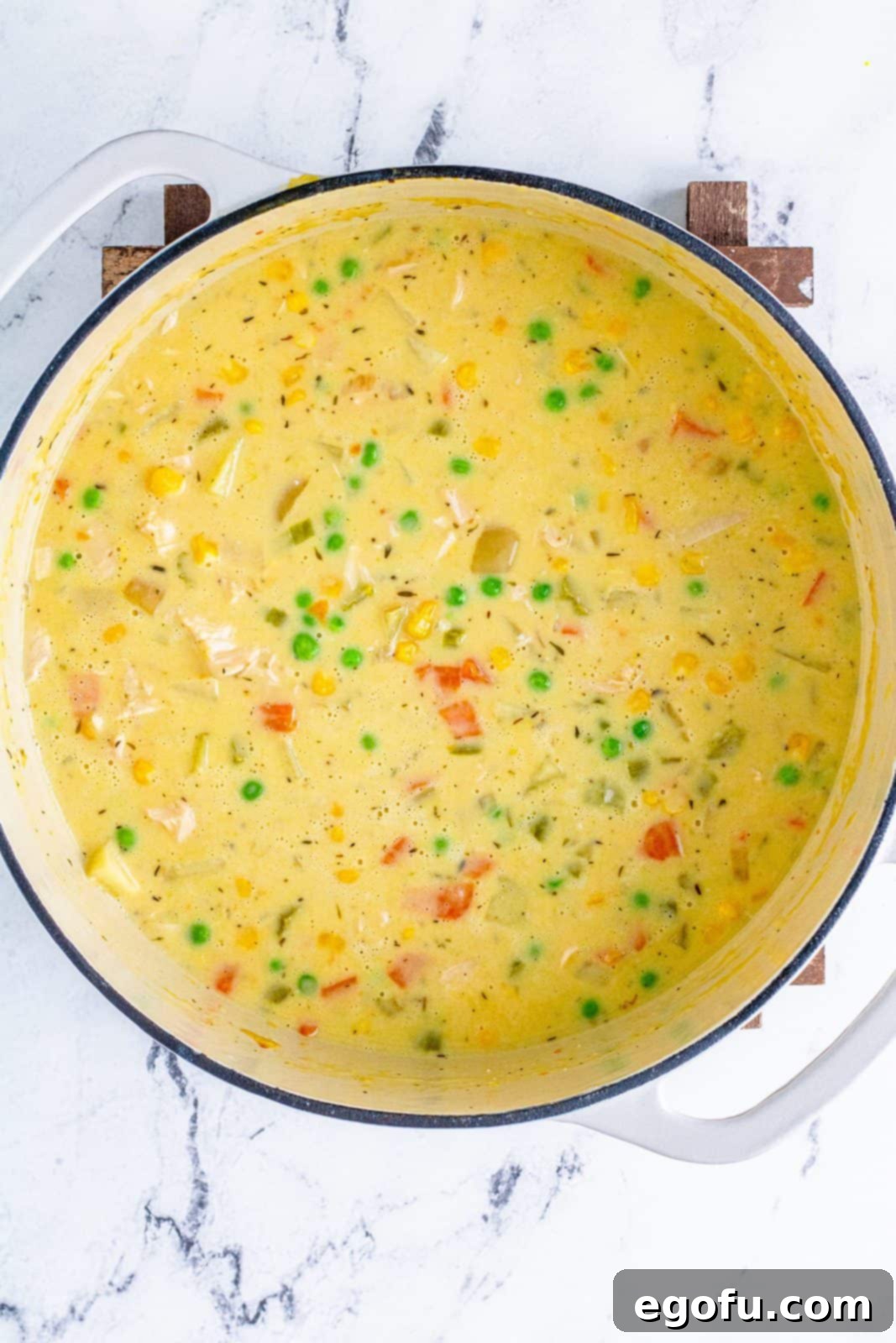Stirred up Chicken Pot Pie Recipe in stockpot.