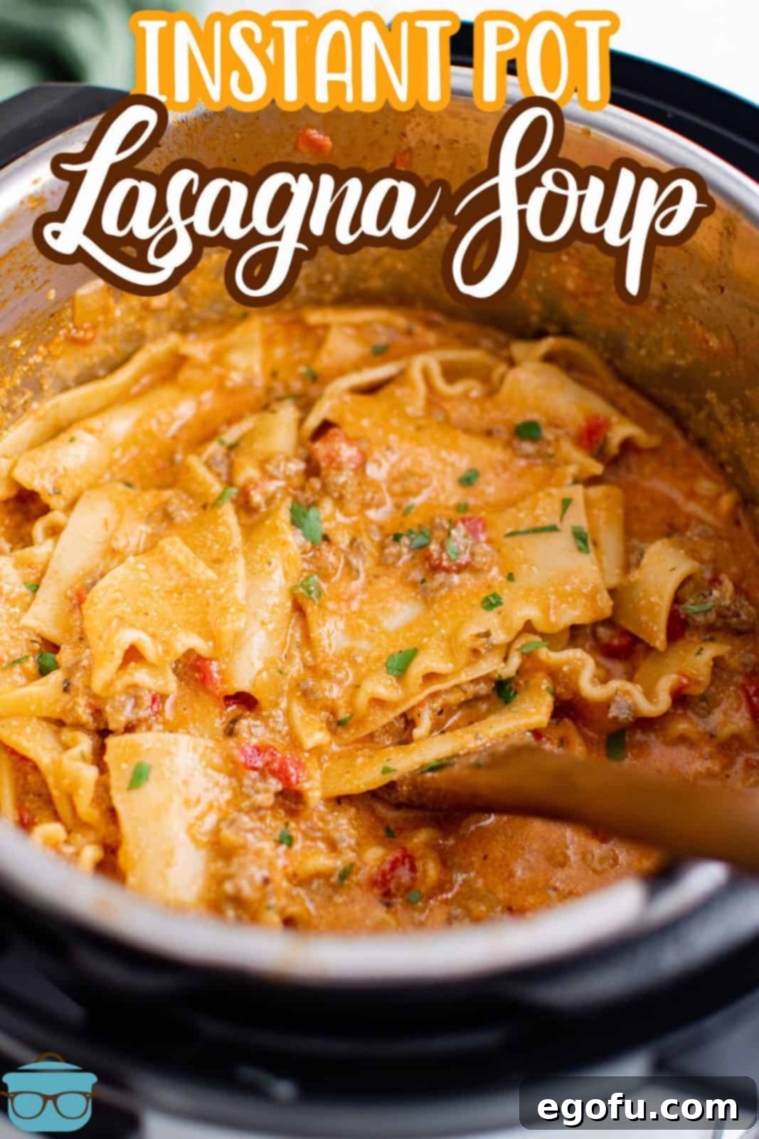 Pinterest image of Instant Pot Lasagna Soup in instant pot with wooden spoon.