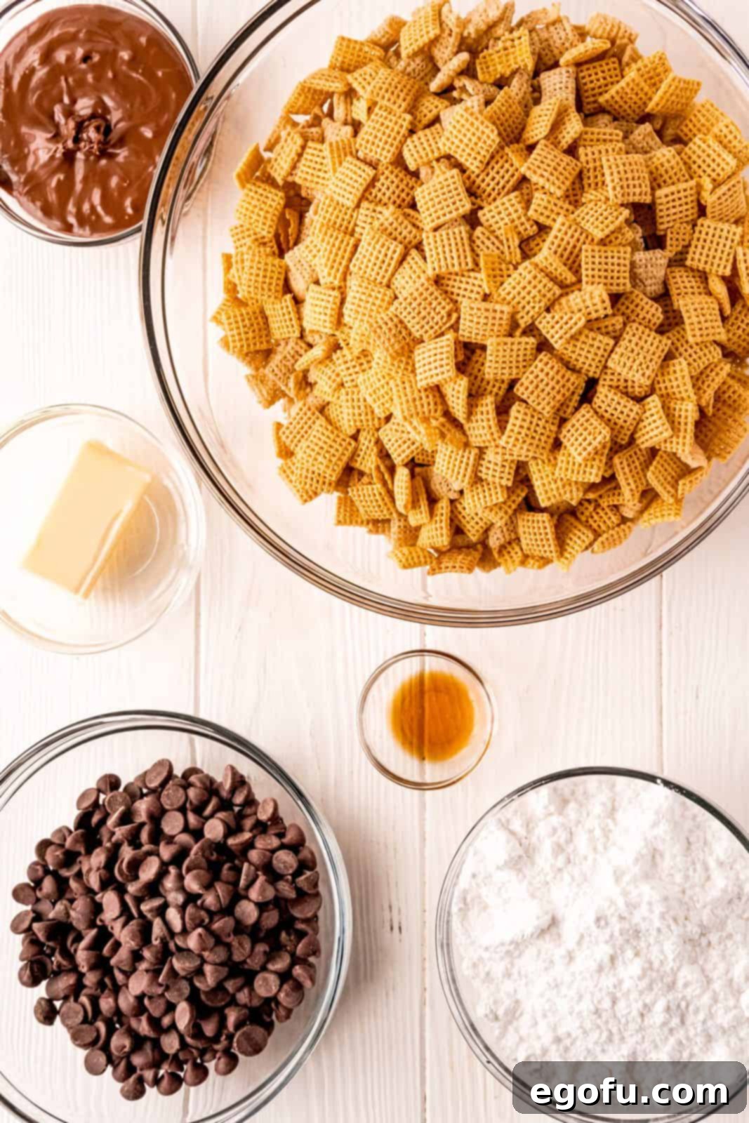 Ingredients needed: rice chex, Nutella, semi-sweet chocolate chips, salted butter, vanilla extract and powdered sugar.