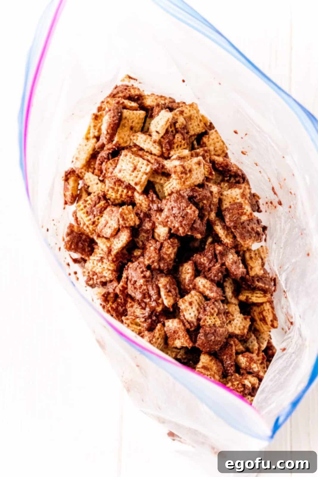 Chex mixture placed into ziptop bag.