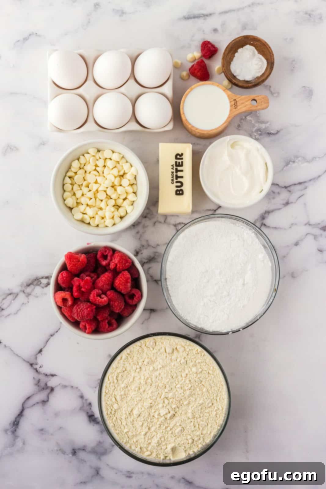 Ingredients needed: salted butter, granulated sugar, eggs, sour cream, milk, all-purpose flour, baking powder, baking soda, raspberries, white chocolate chips, heavy cream, water and cornstarch.