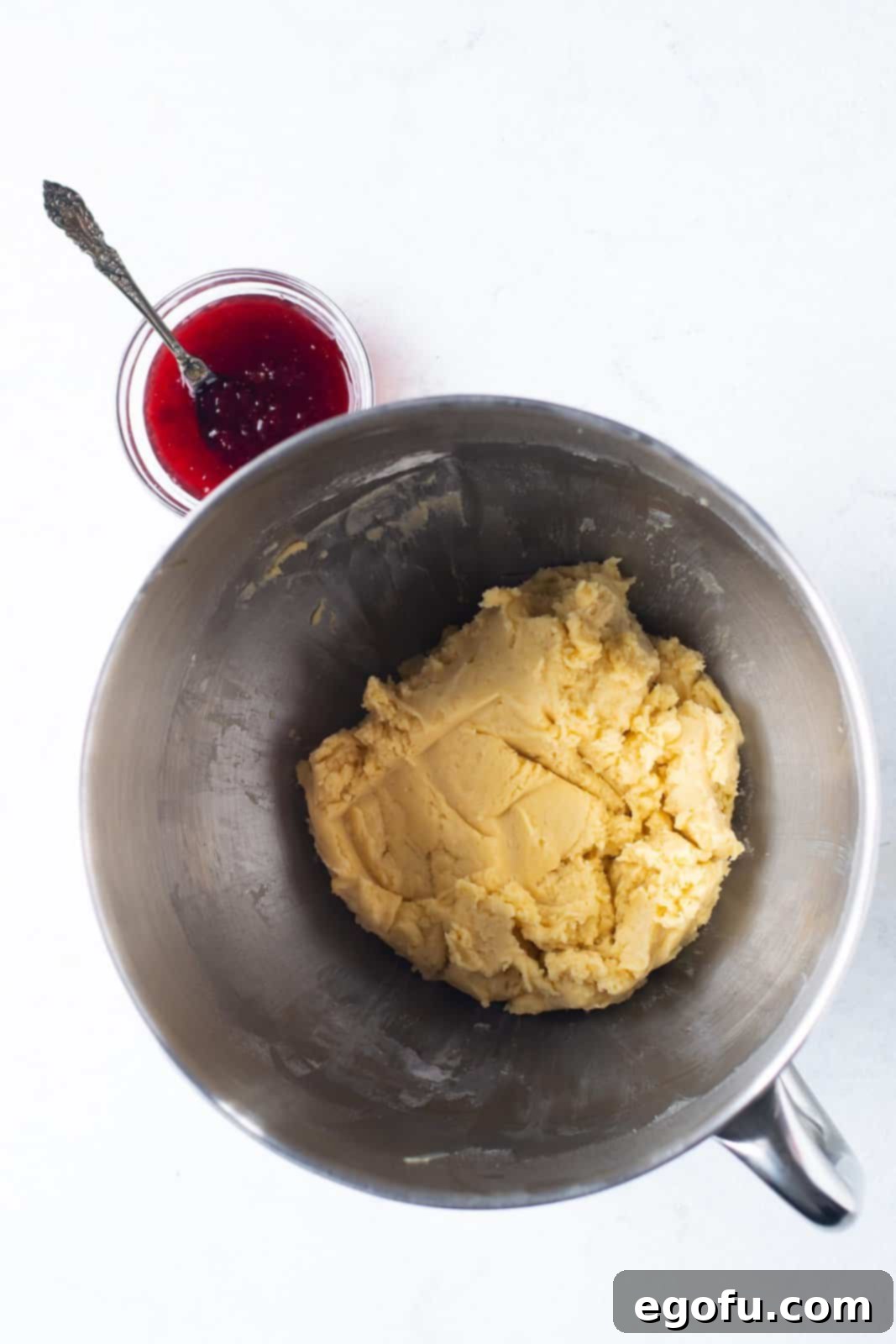 Flour added to mixture creating a dough.