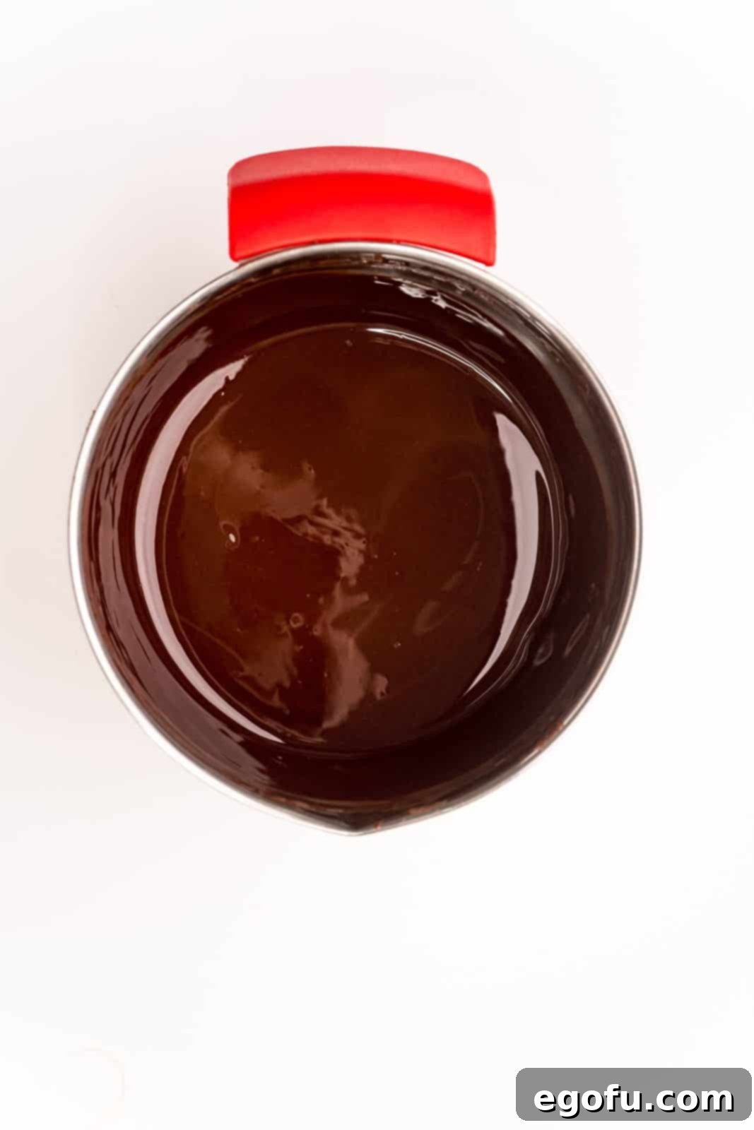 Melted chocolate, butter and espresso powder in pan.