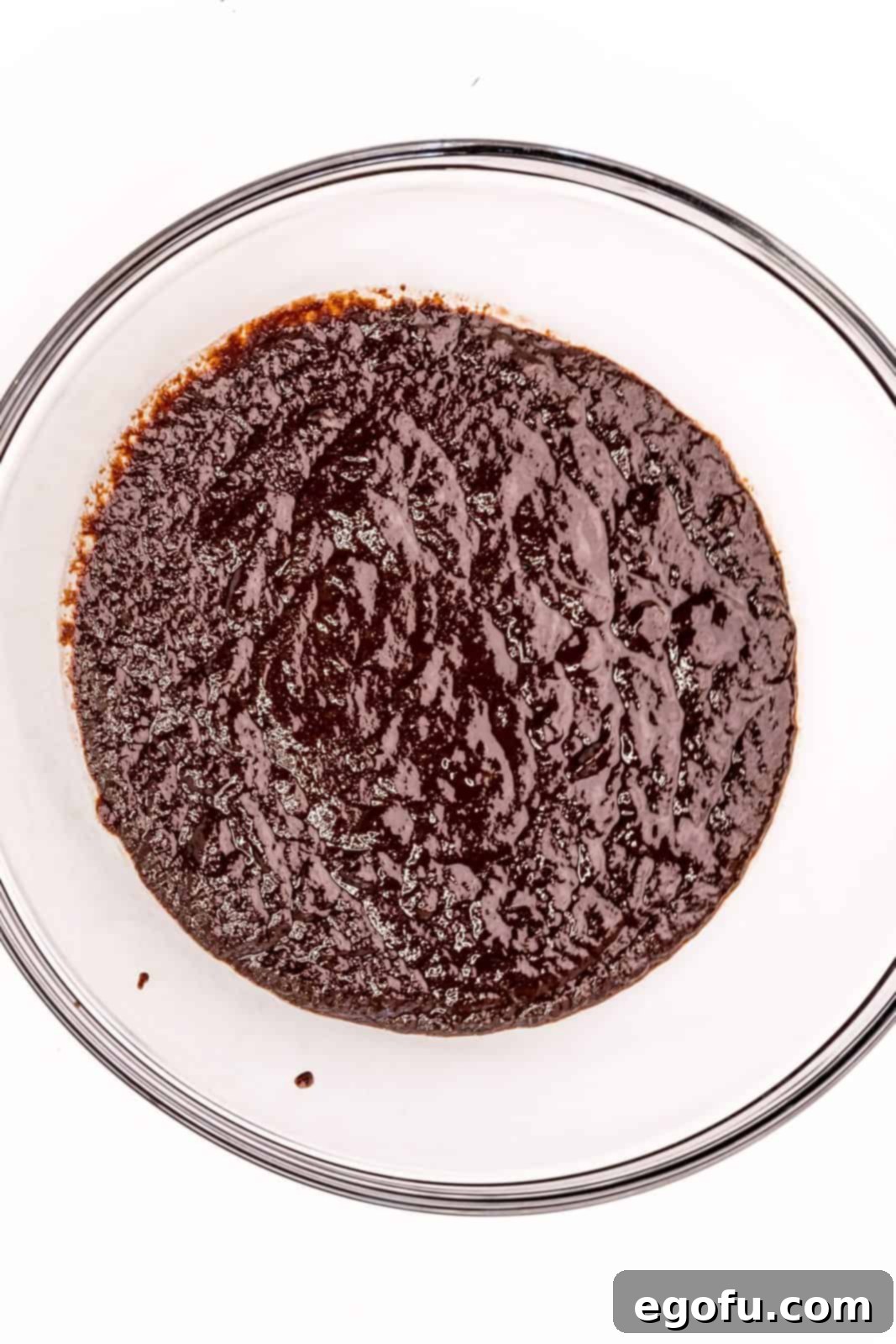 Sugars, eggs and vanilla whisked into melted chocolate.