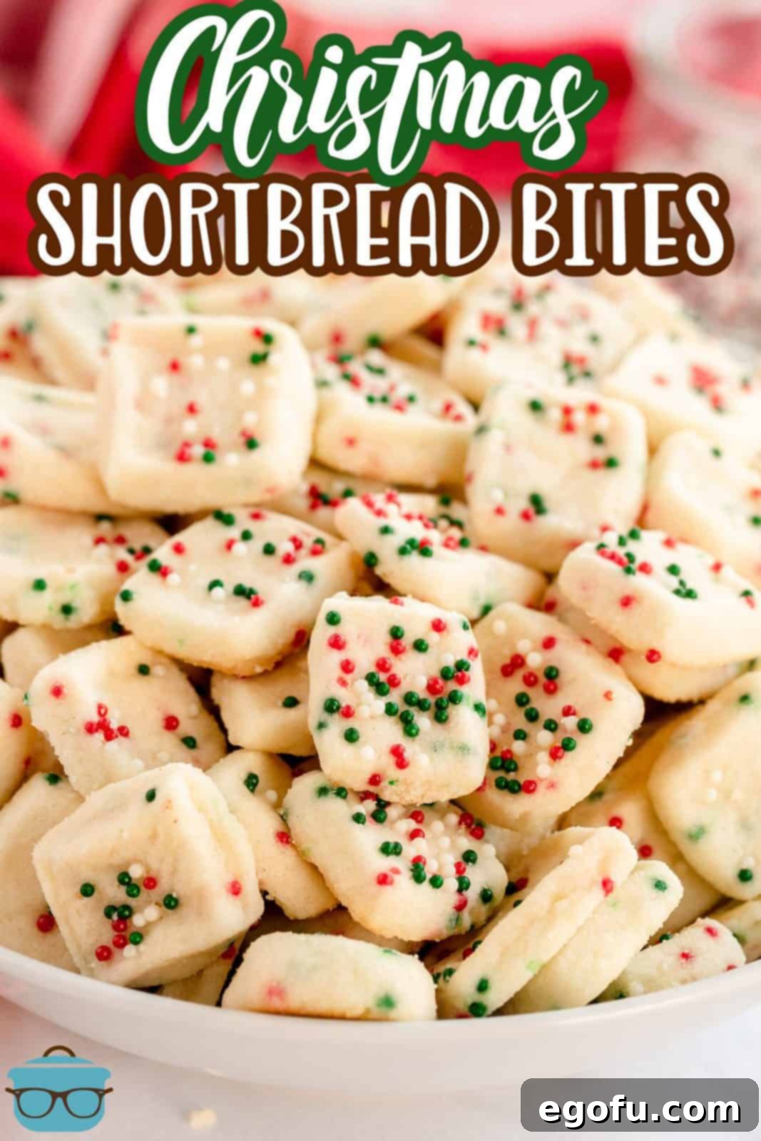 Close-up of Mini Christmas Shortbread Cookies in a bowl, showing the vibrant sprinkles.