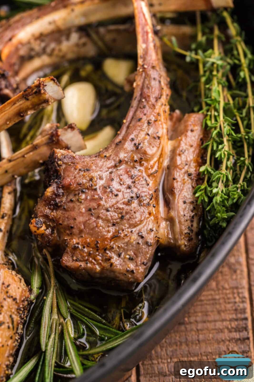 Succulent Lamb Chops 2 Close up of perfectly cooked Lamb Chops with fresh Mint Pesto, artfully arranged in a baking dish, ready to be served.