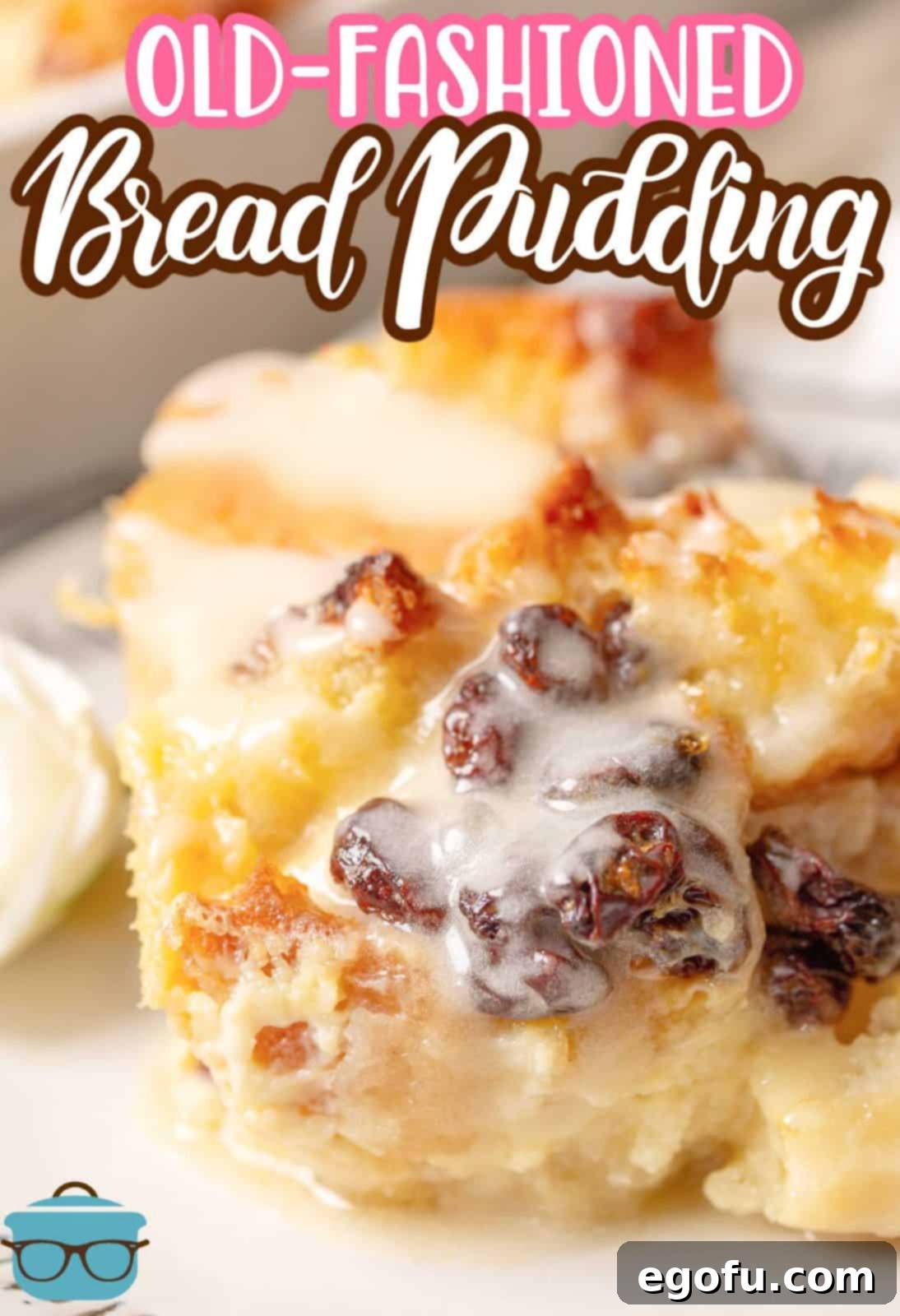 A stunning overhead view of a finished Old Fashioned Bread Pudding, glistening with a generous drizzle of sweet sauce and dotted with plump raisins.