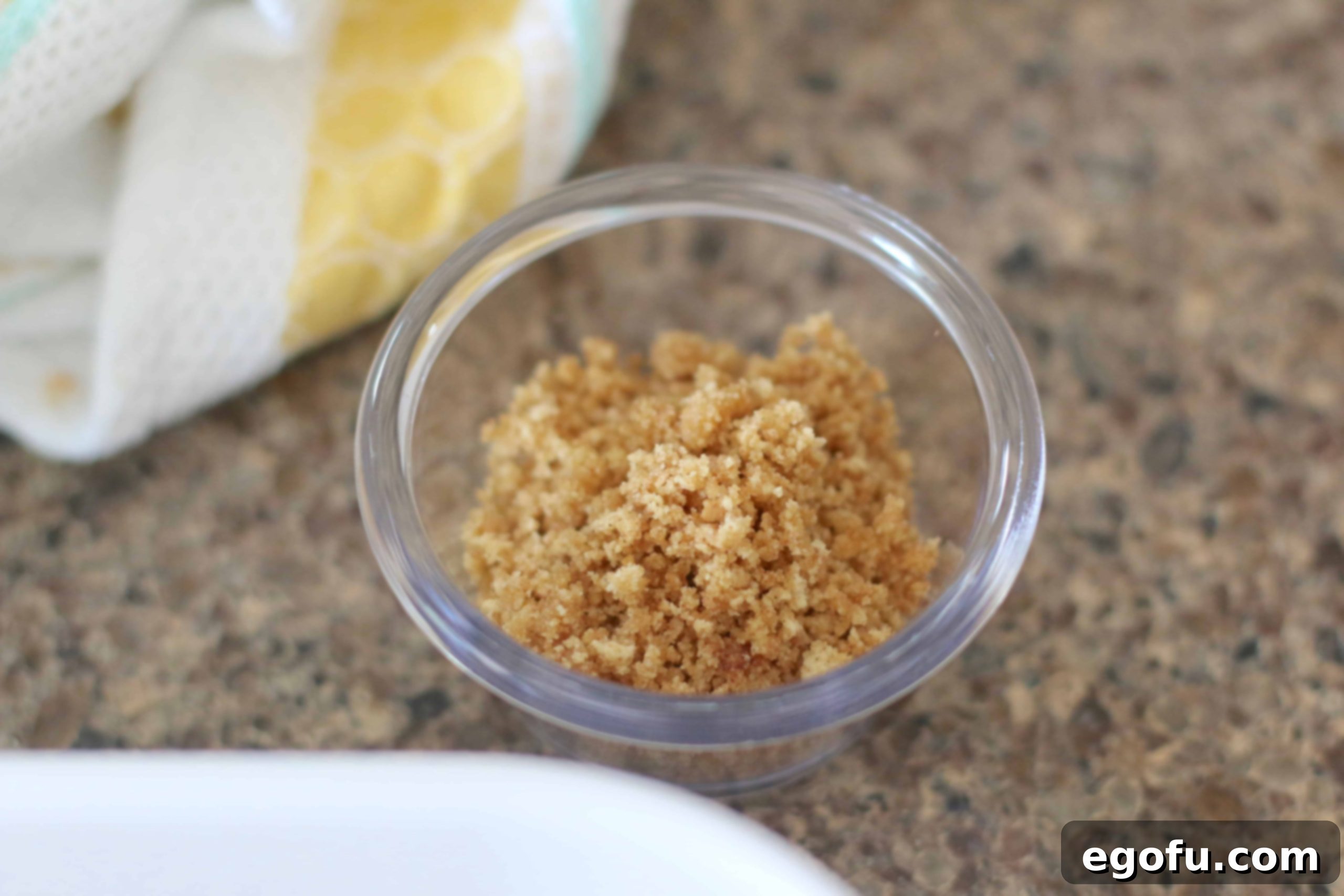 Two tablespoons graham cracker crumbs in a small bowl.