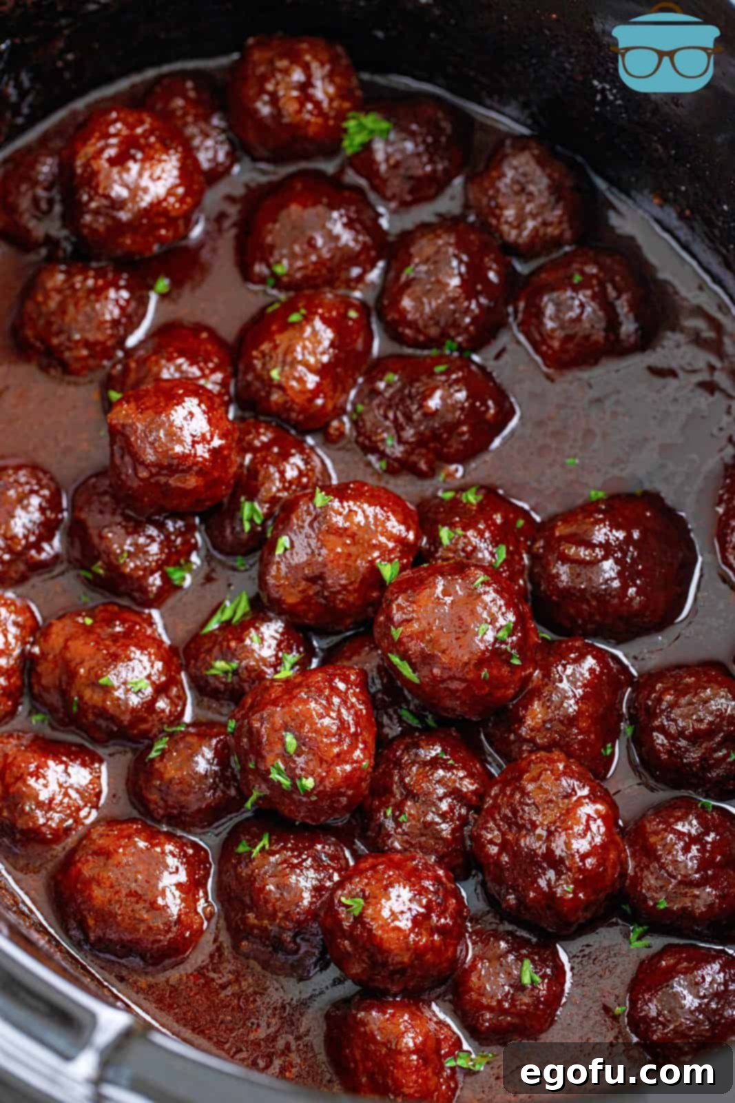 Sweet & Tangy Grape Jelly Meatballs 11 Homemade Grape Jelly Meatballs in crock pot.