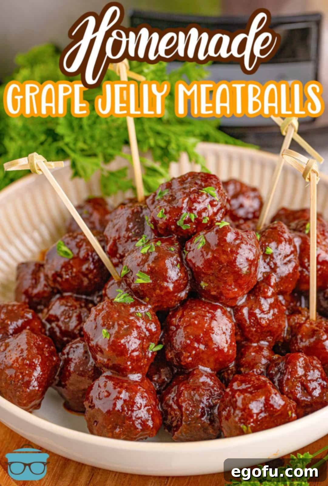Sweet & Tangy Grape Jelly Meatballs 3 Pinterest image of Homemade Grape Jelly Meatballs in dish with cocktail toothpicks.