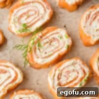 Up close image of sliced Salmon Pinwheels, showing the beautiful spiral.