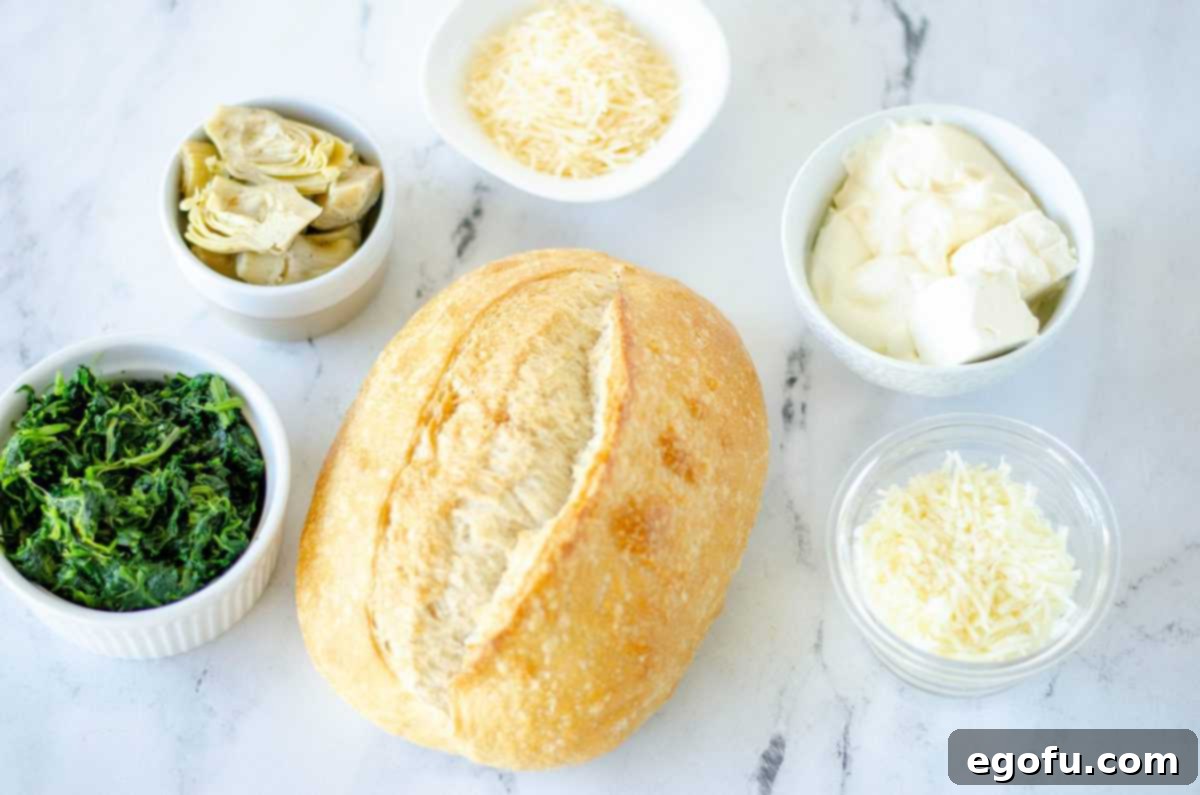 Ingredients needed:sourdough bread, artichokes, frozen spinach, sour cream, cream cheese, shredded mozzarella cheese, parmesan cheese, garlic powder, salt and pepper.