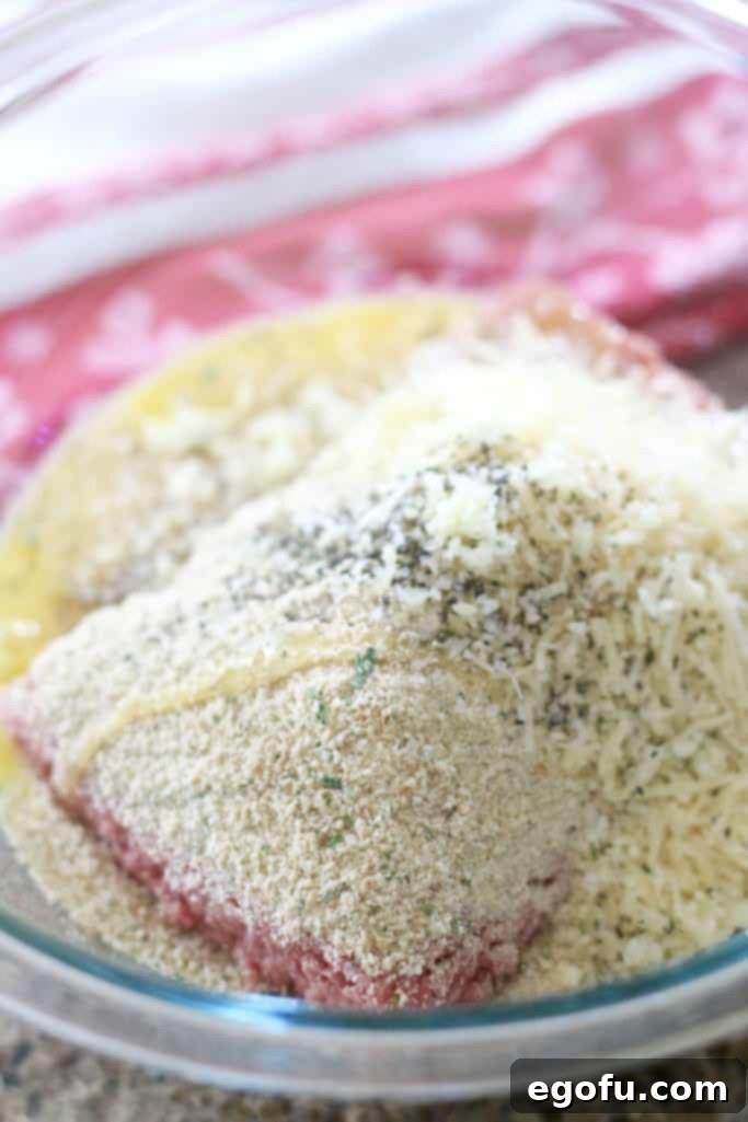 Slow Simmered Homemade Meatballs with Zesty Marinara 10 ground beef, bread crumbs, herbs and Parmesan cheese in a large bowl