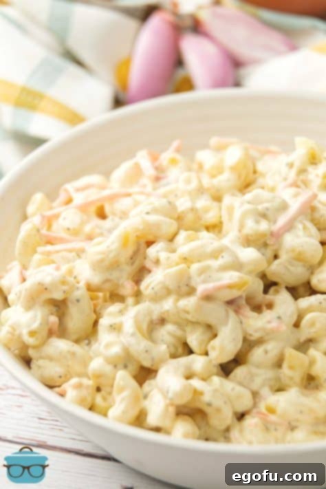 Creamy Hawaiian Macaroni Salad 14 overhead photo of macaroni salad in a white bowl.