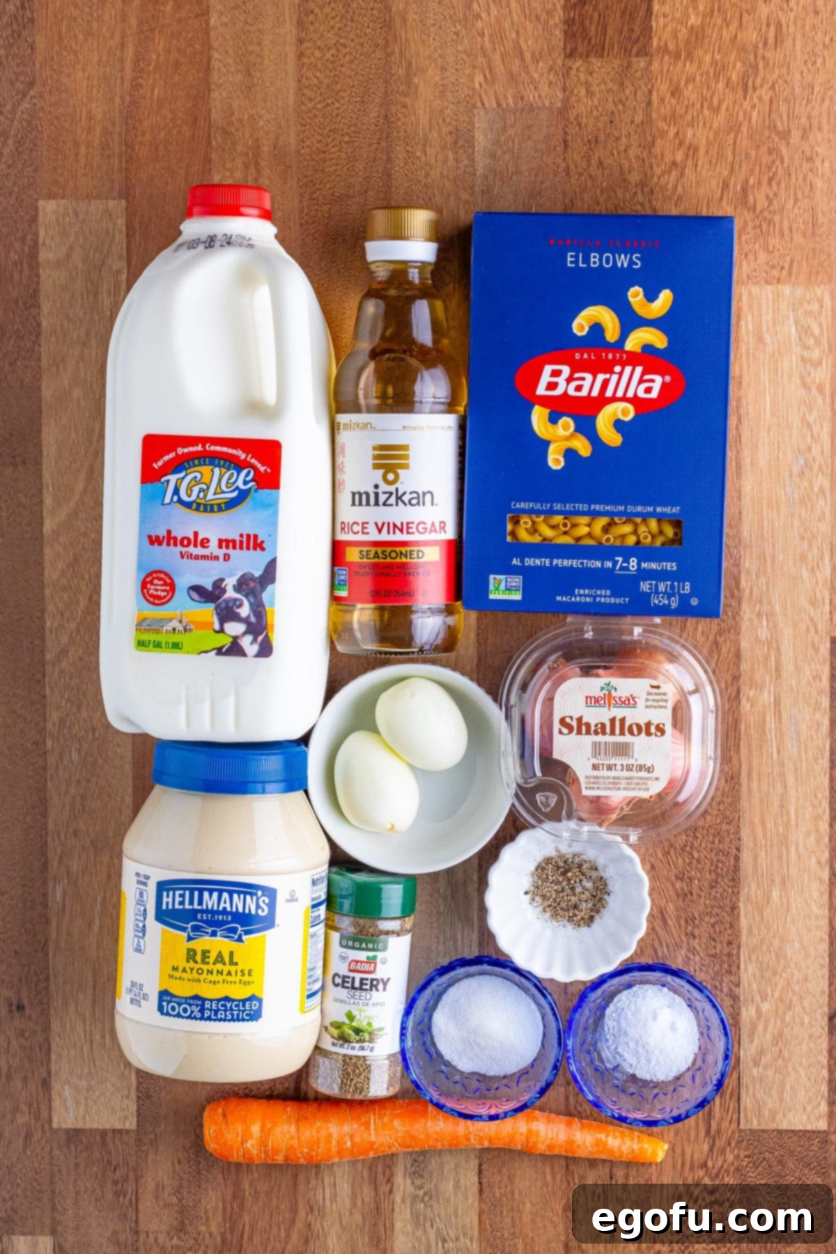 Creamy Hawaiian Macaroni Salad 4 elbow macaroni, shredded carrots, shallot, boiled eggs, mayonnaise, milk. seasoned rice vinegar, sugar, salt and black pepper, celery seed.