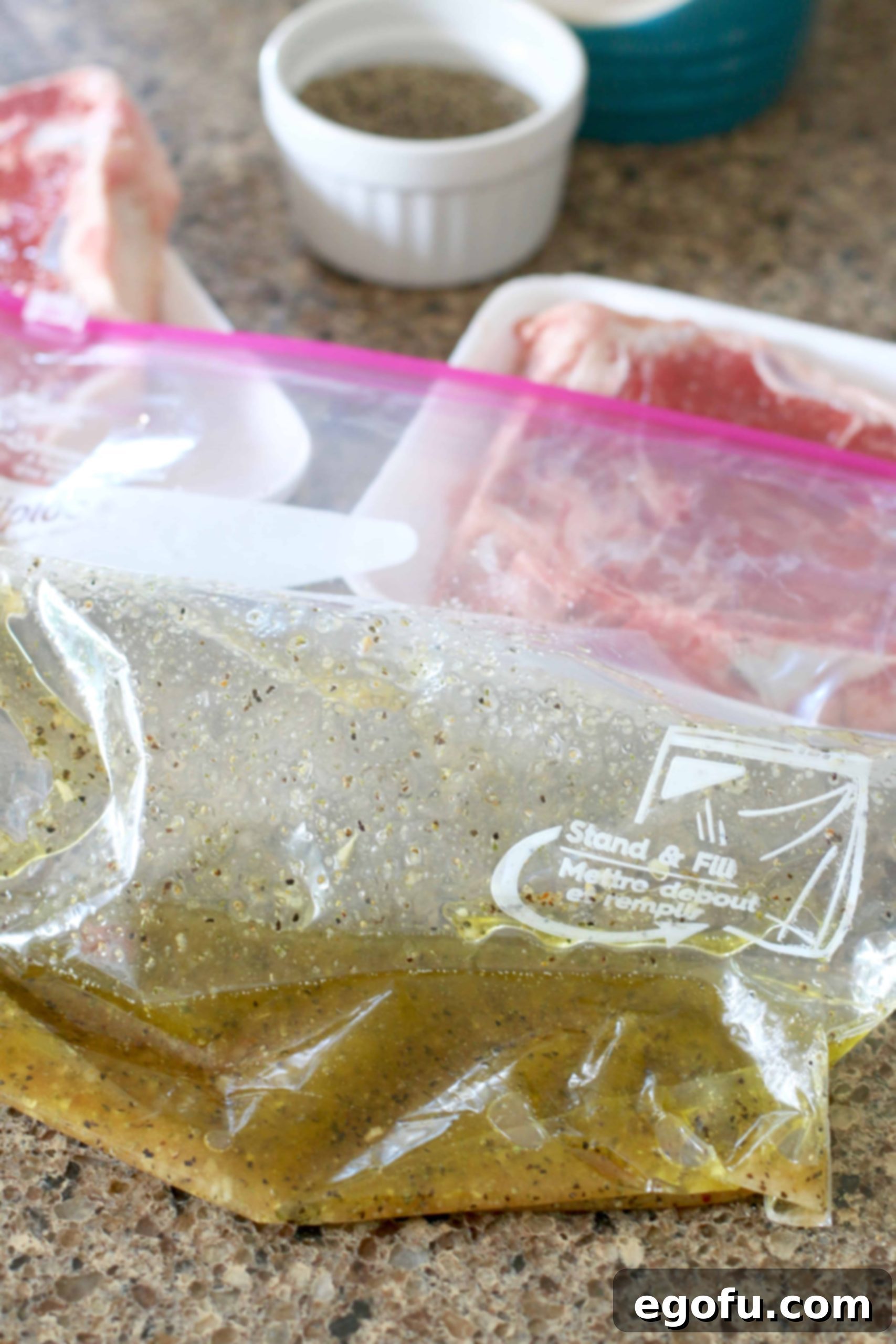 All steak marinade ingredients have been added to a resealable plastic bag and are ready to be combined.