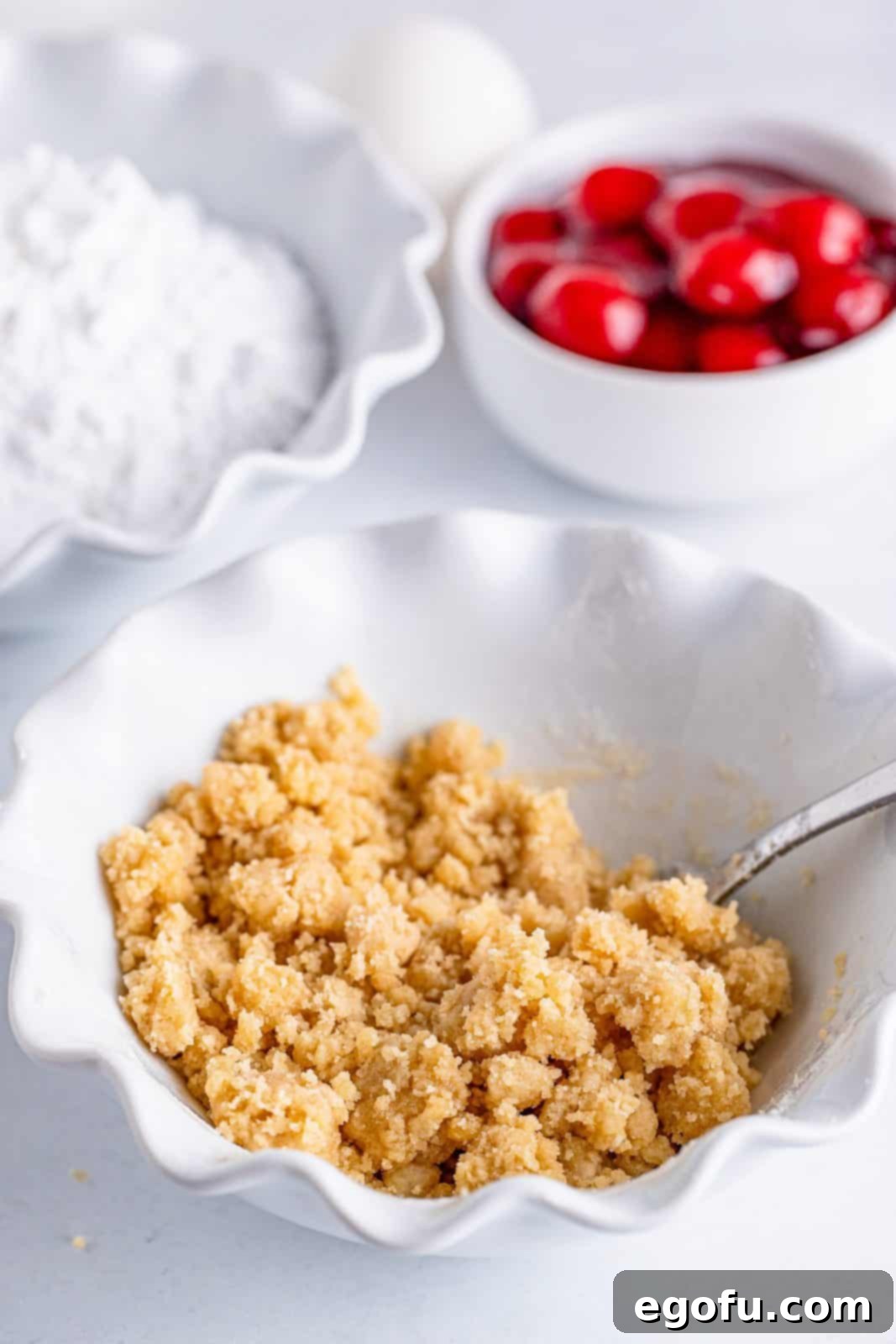 Buttery Cherry Crumble Danishes 6 Crumble topping mixed together in a bowl.