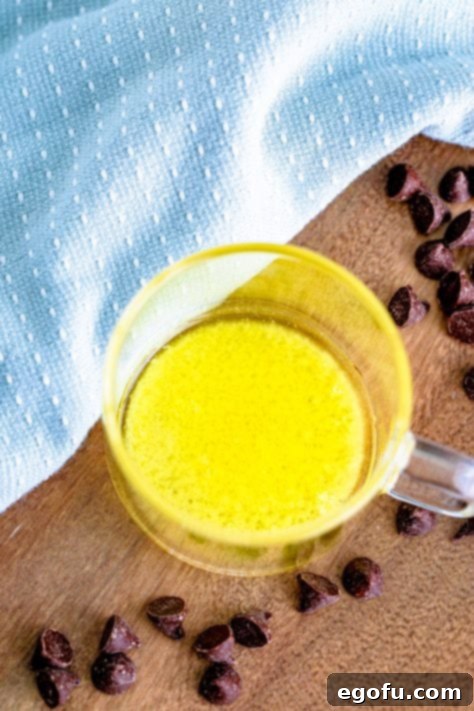 melted butter in a clear mug.