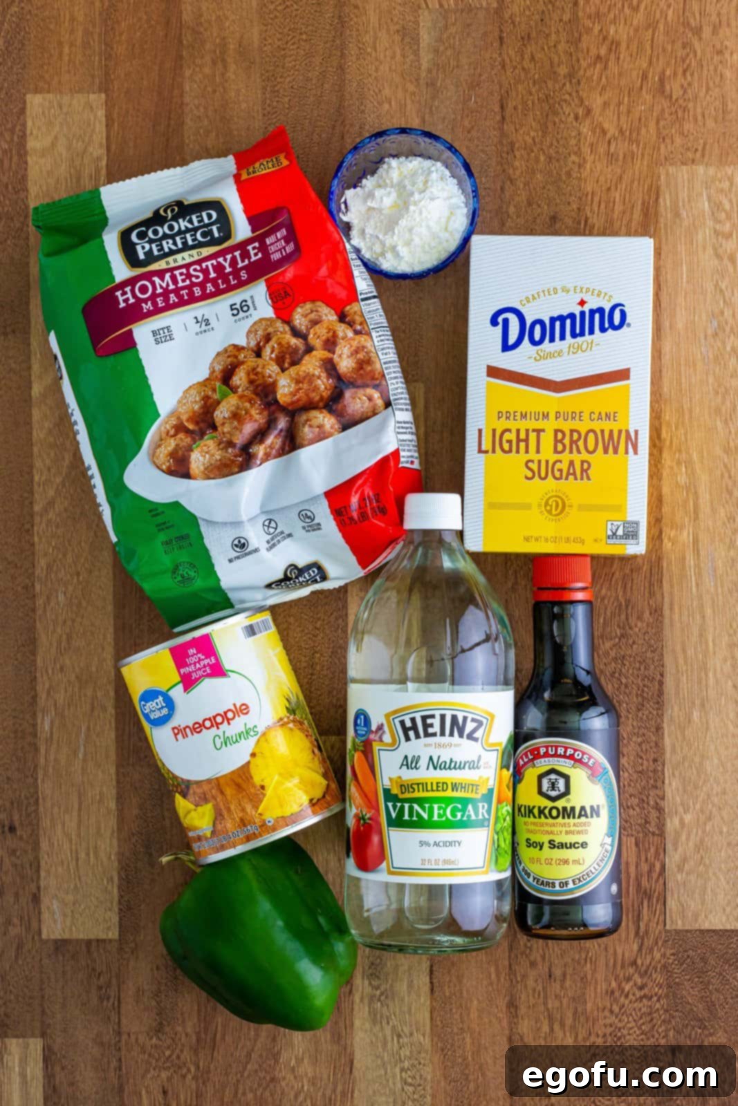 Sticky Sweet & Sour Crockpot Meatballs 5 Frozen meatballs, pineapple, soy sauce, brown sugar, green pepper, cornstarch.