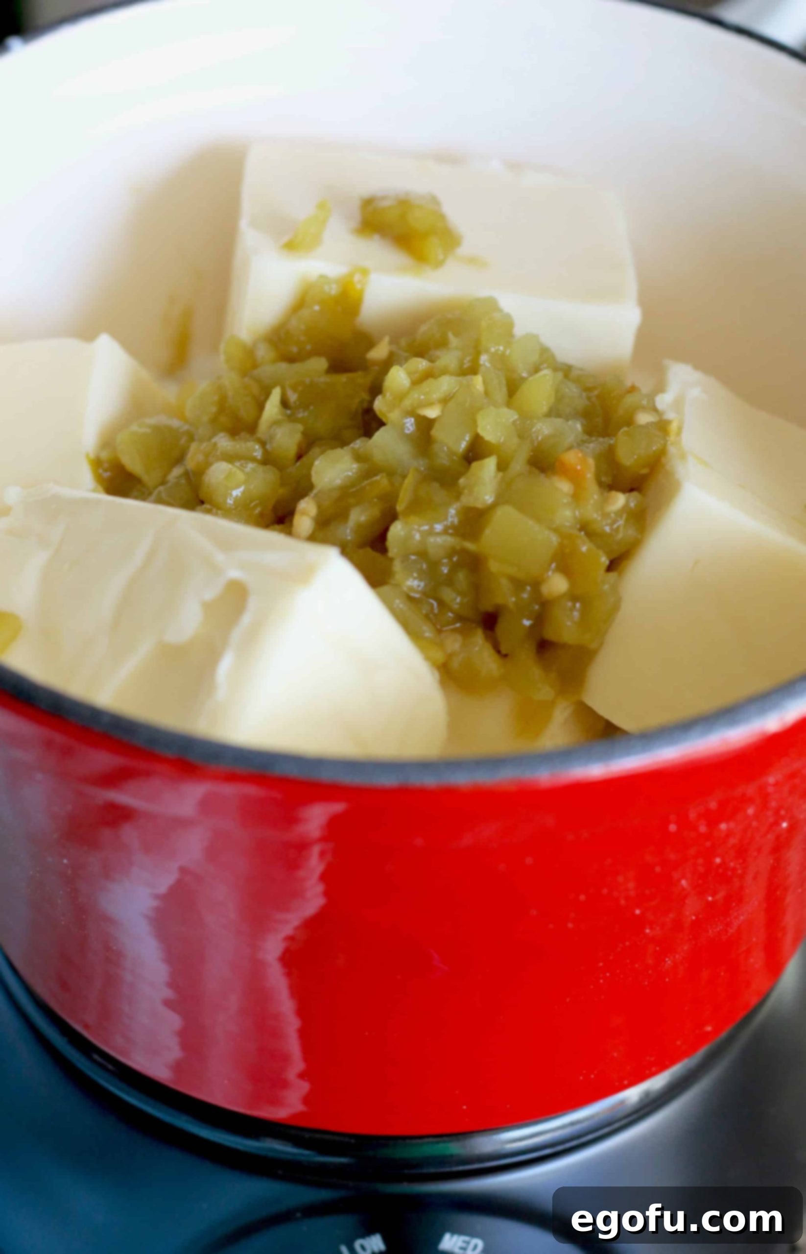 diced green chiles added to mini crock pot.