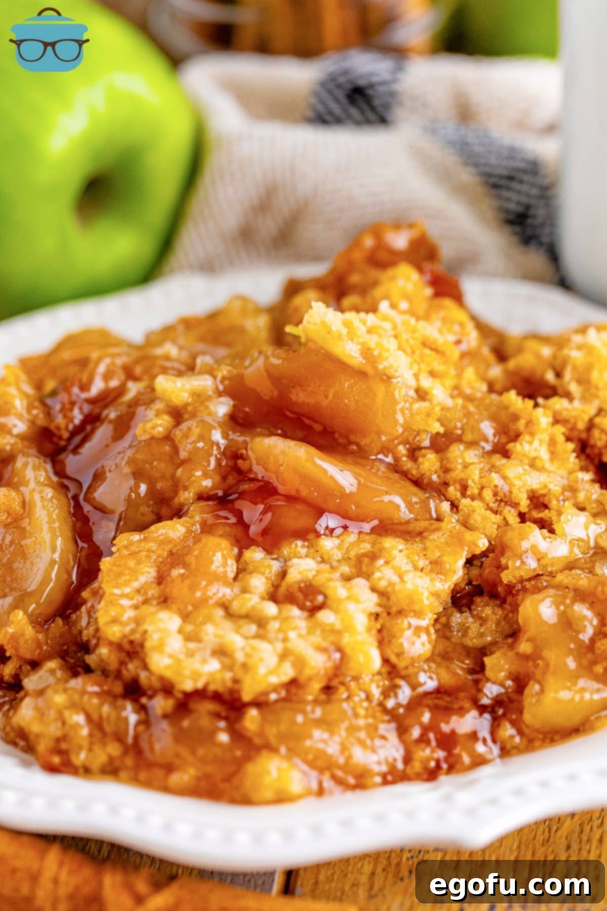 A large pie plate of Apple Dump Cake made in the Crock Pot.